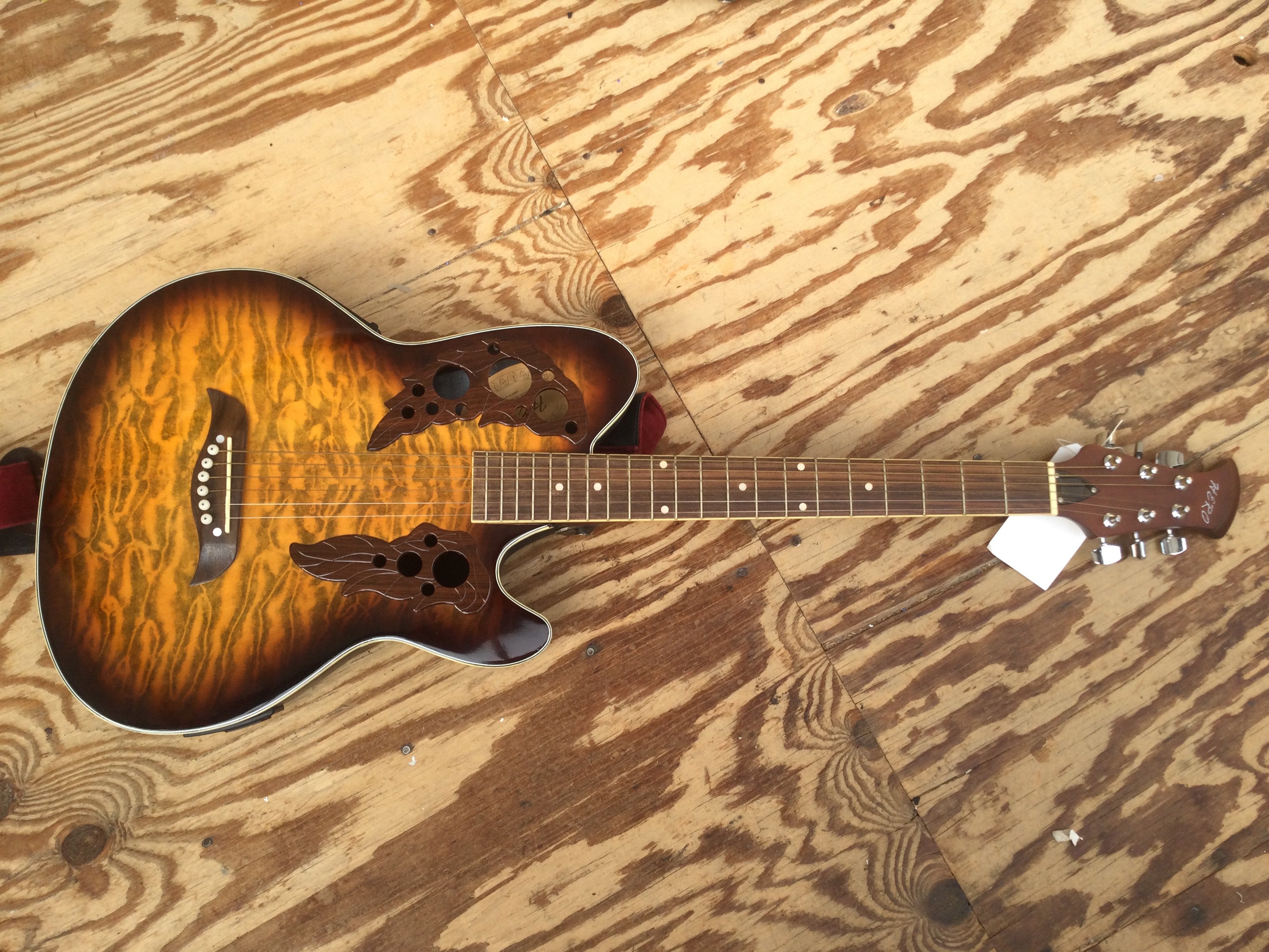 A Hero bowl back electro acoustic guitar. No case.