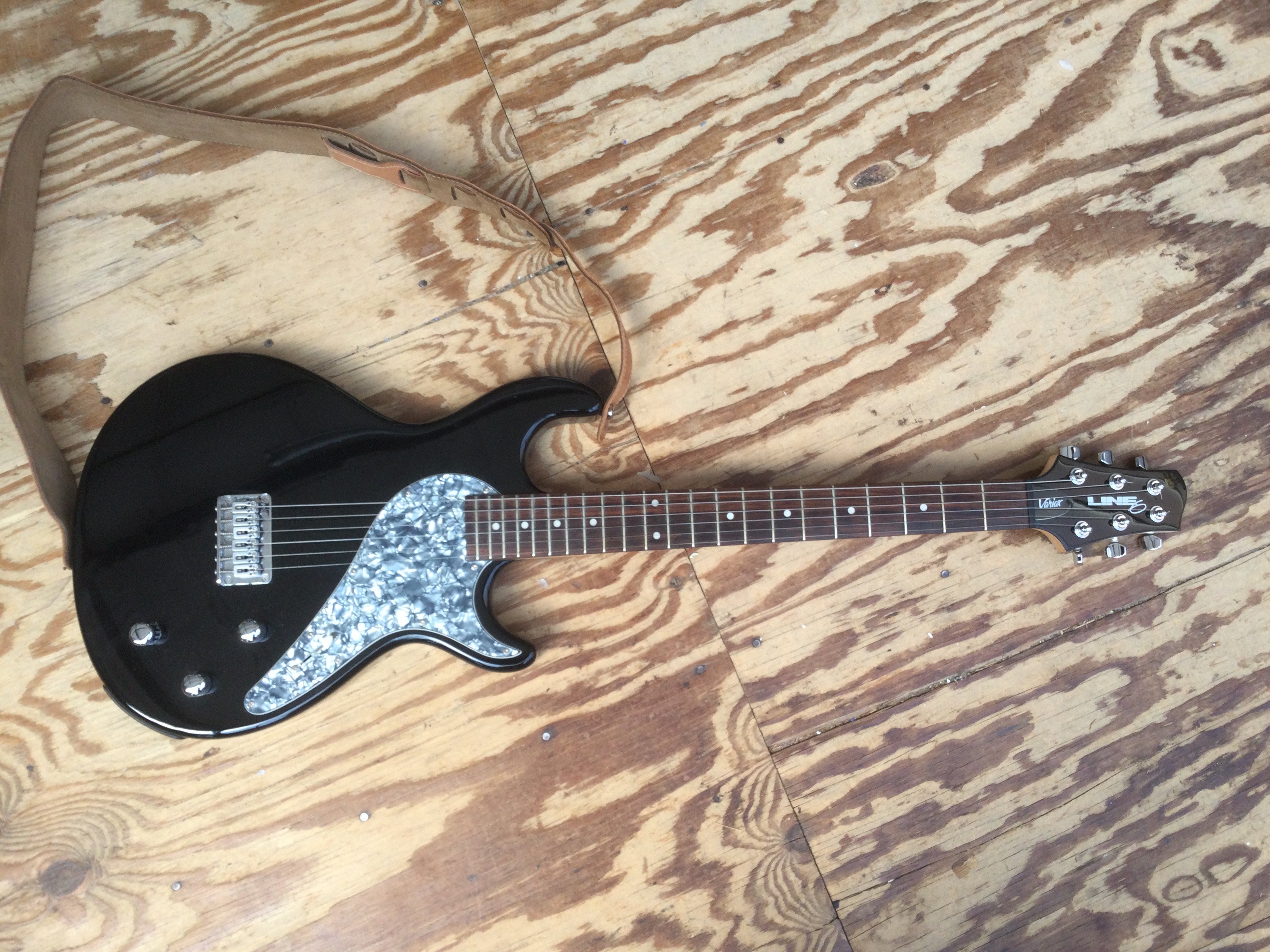 A Line 6 Variax electric guitar. Comes with original soft carry case.