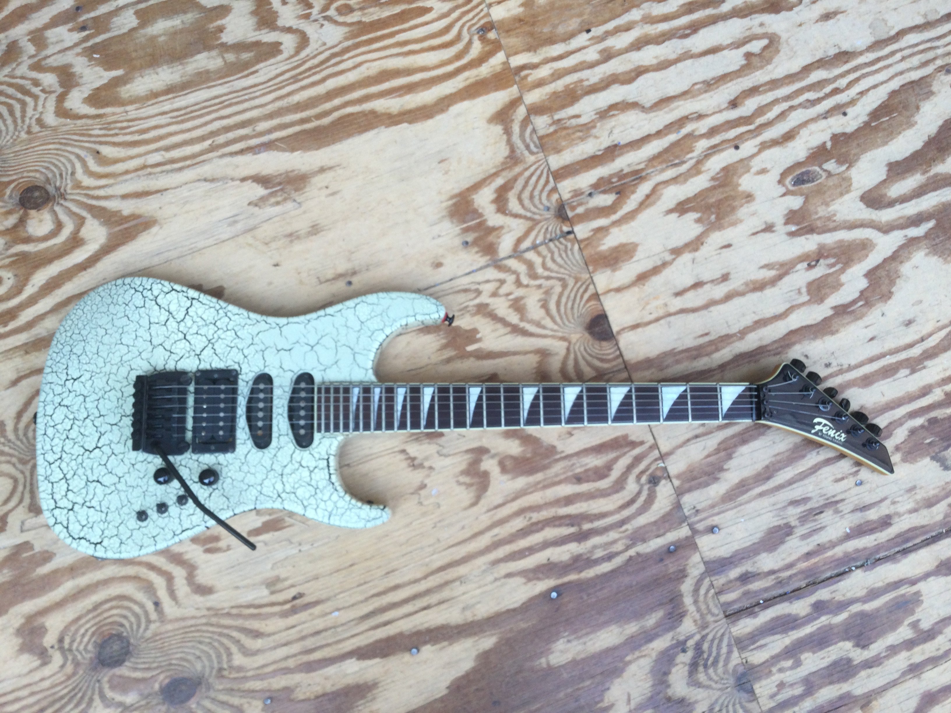 A Fenix by Young Chang electric guitar. Comes with a soft carry case.