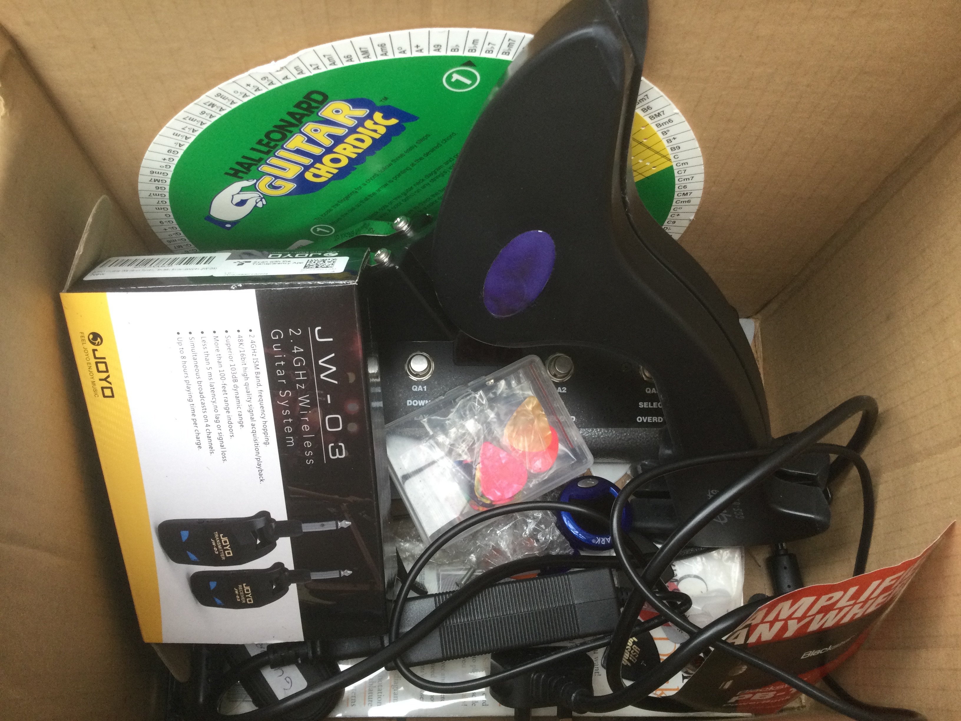 A Blackstar Stereo 10 V3 amplifier and various guitar related accessories.