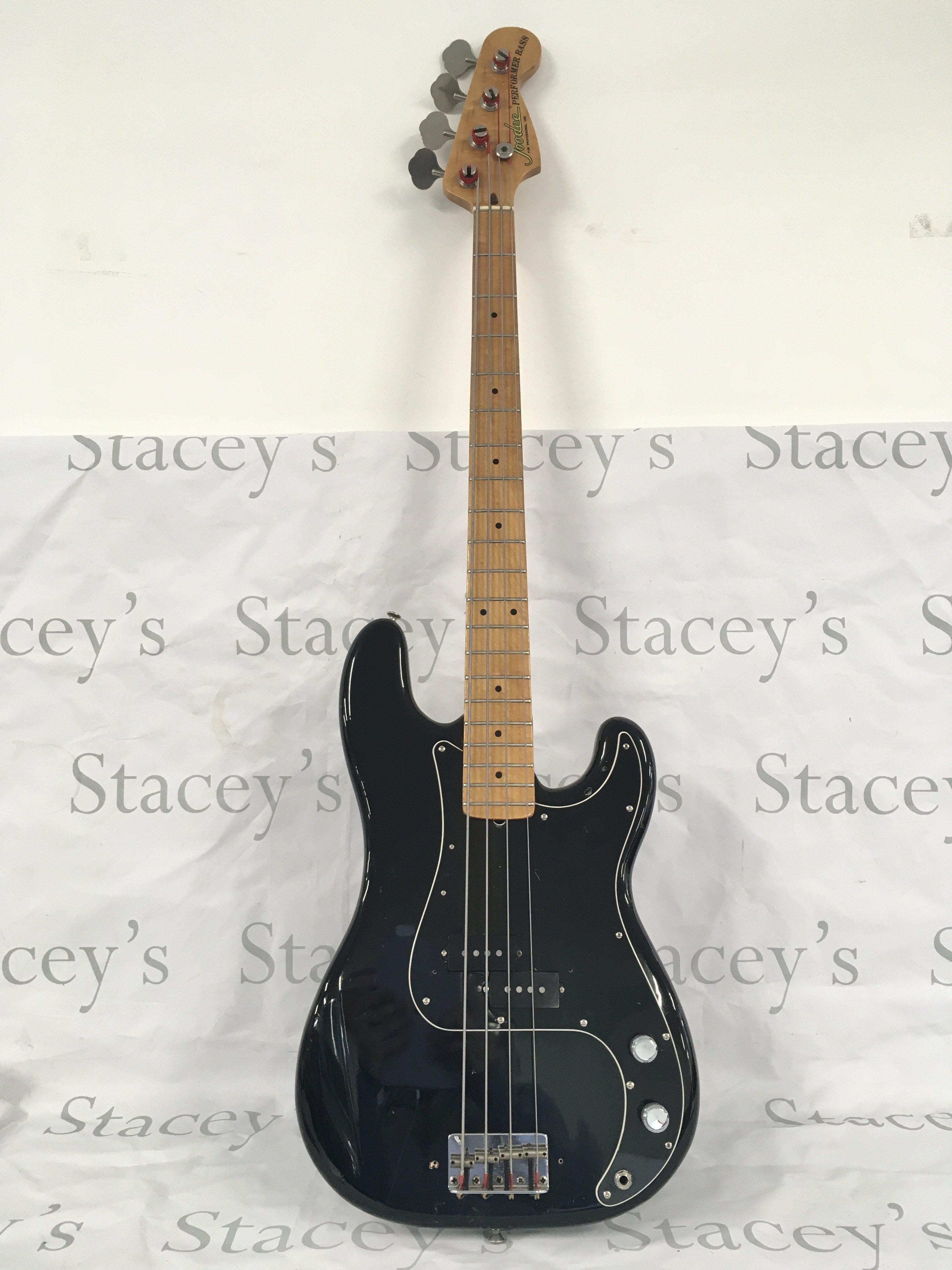 A Jodee Performer bass guitar. Comes with a soft carry case.