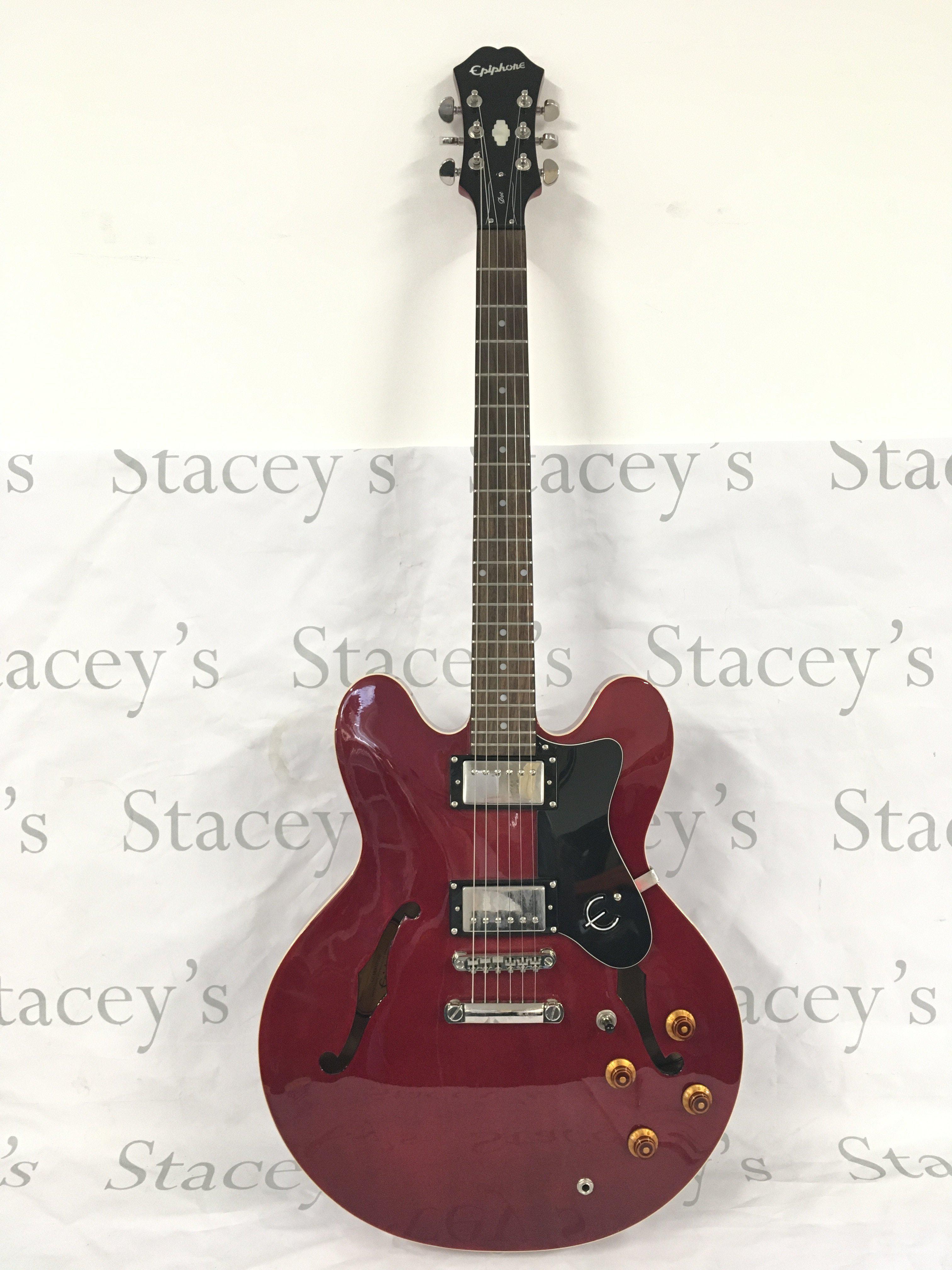 An Epiphone Dot electric guitar with hard carry case.