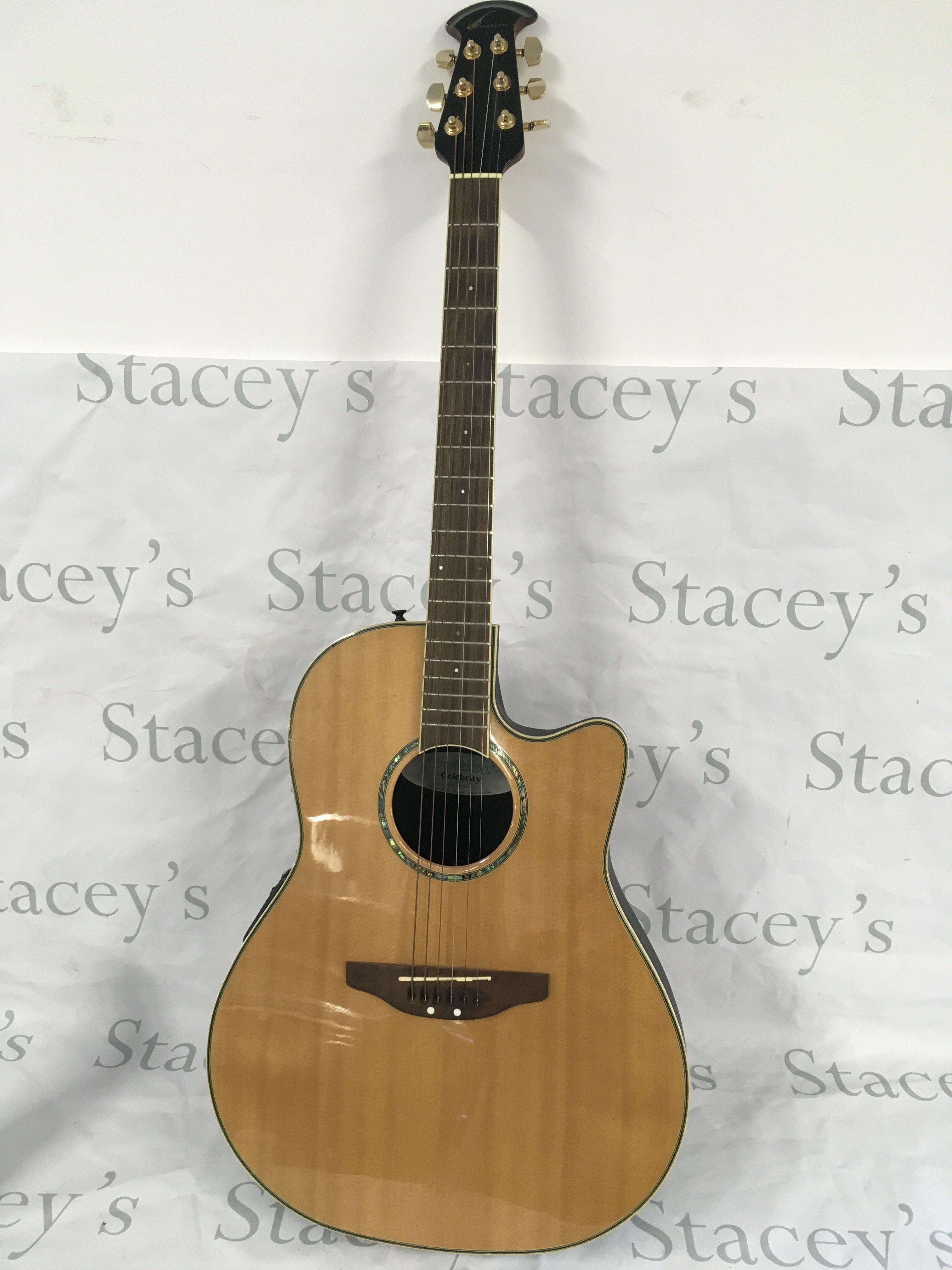 An Ovation Celebrity bowl back electro acoustic guitar. Comes with original hard carry case.