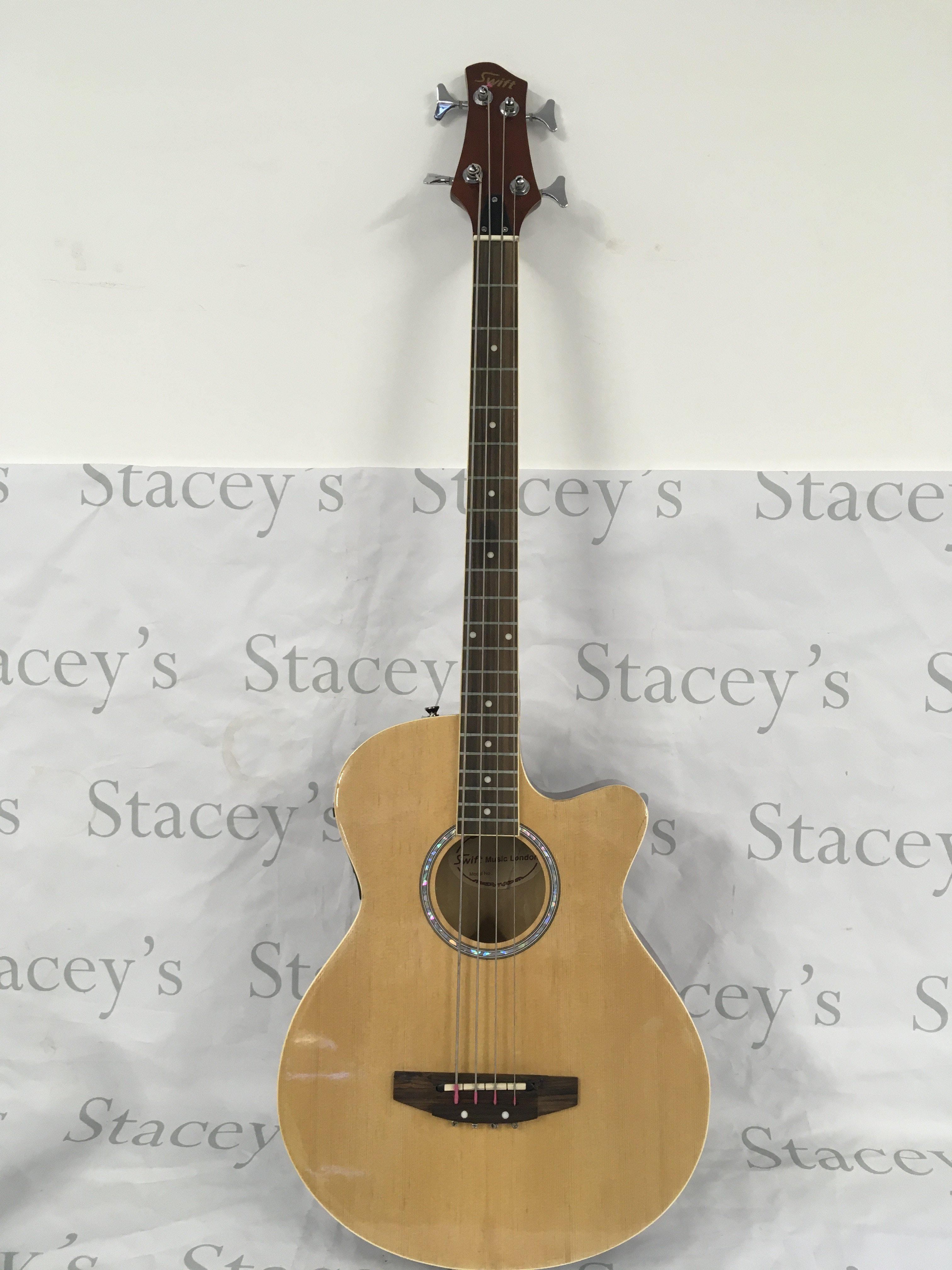 A Swift electro acoustic bass guitar. Comes with a soft carry case.