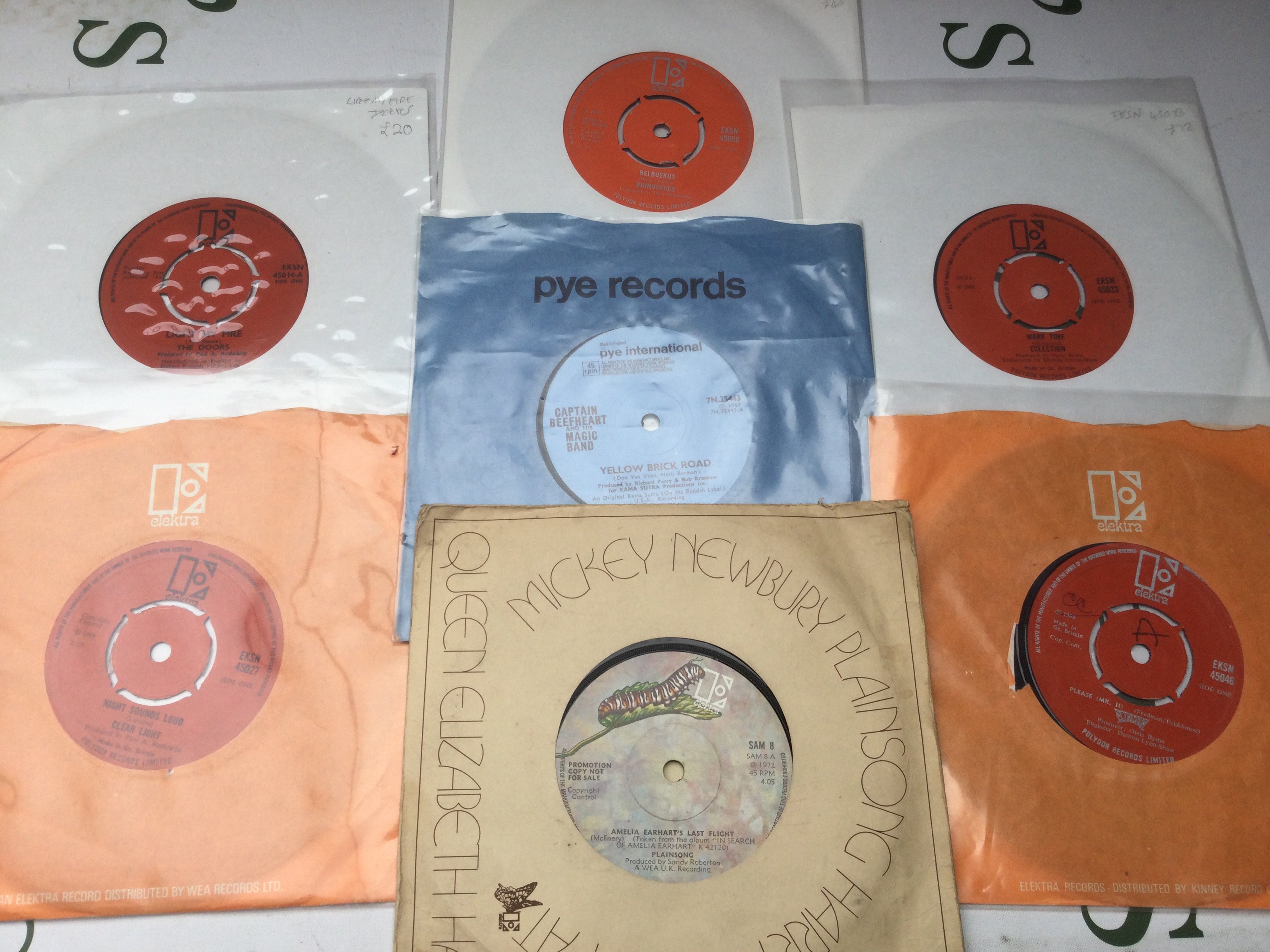 Seven rare 7" singles comprising mainly Elektra label releases by various artists including The Doors, Clear Light and others.