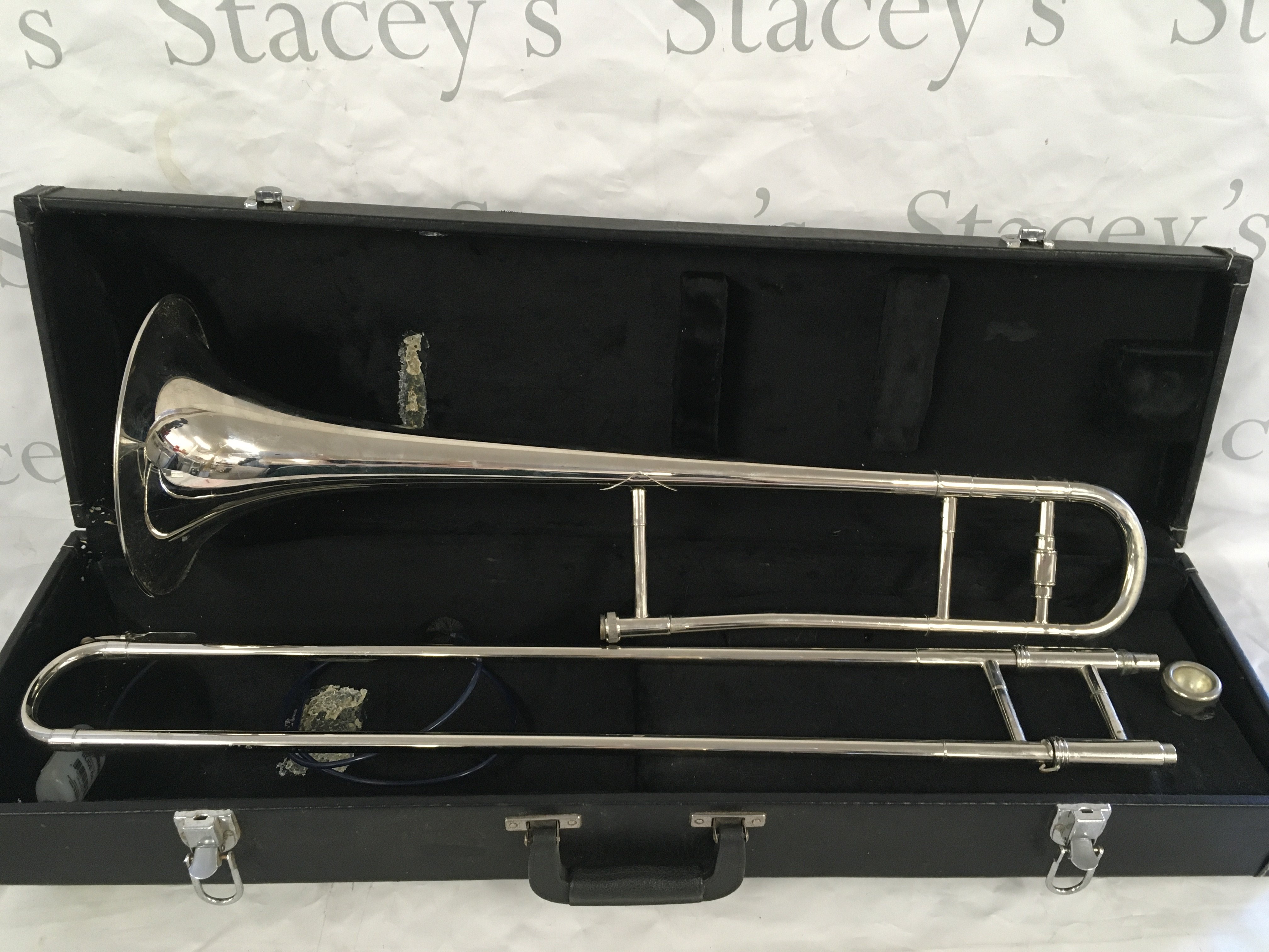 A cased trombone.