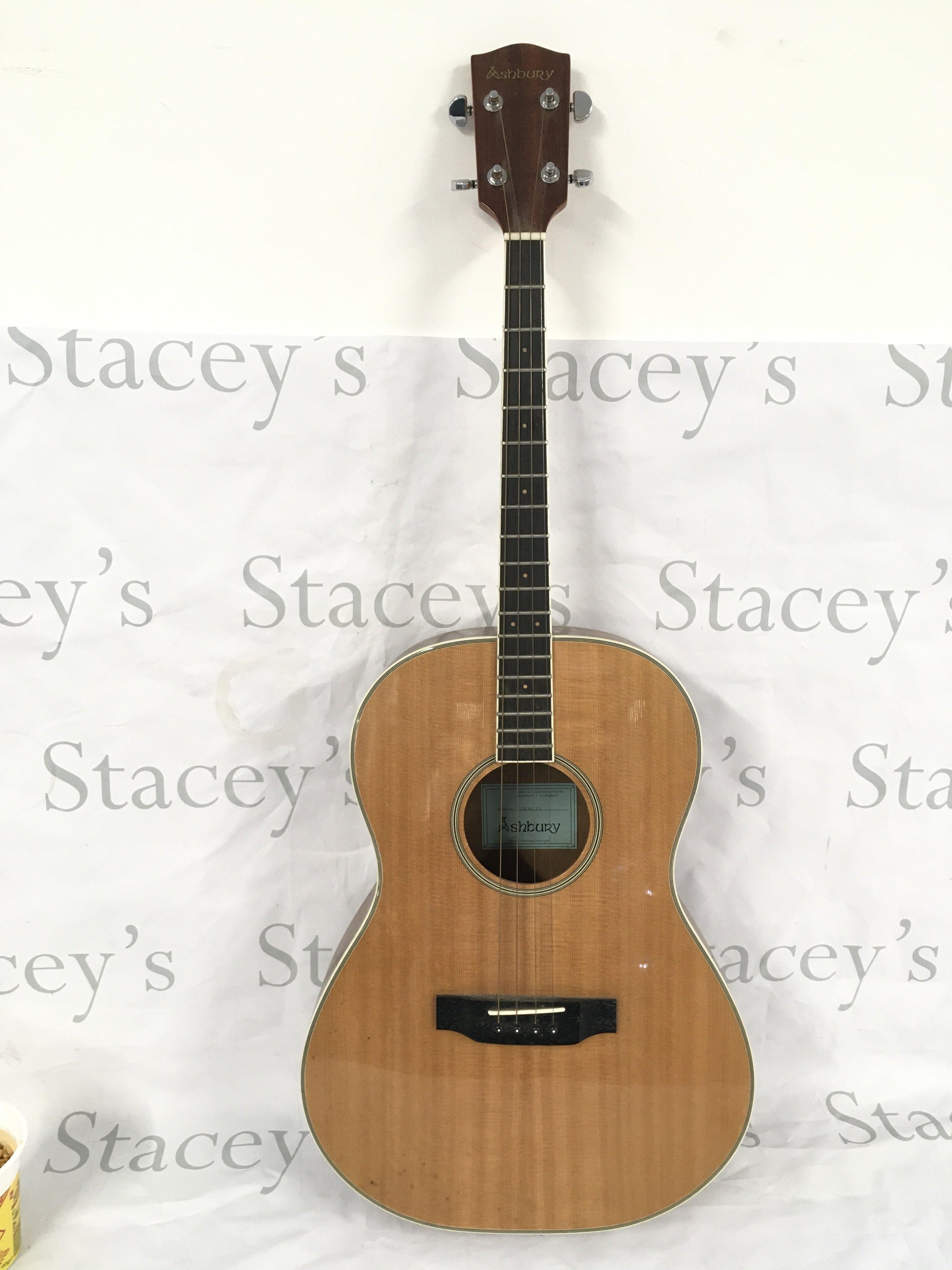An Ashbury GR36113 four string tenor guitar with fitted carry case.