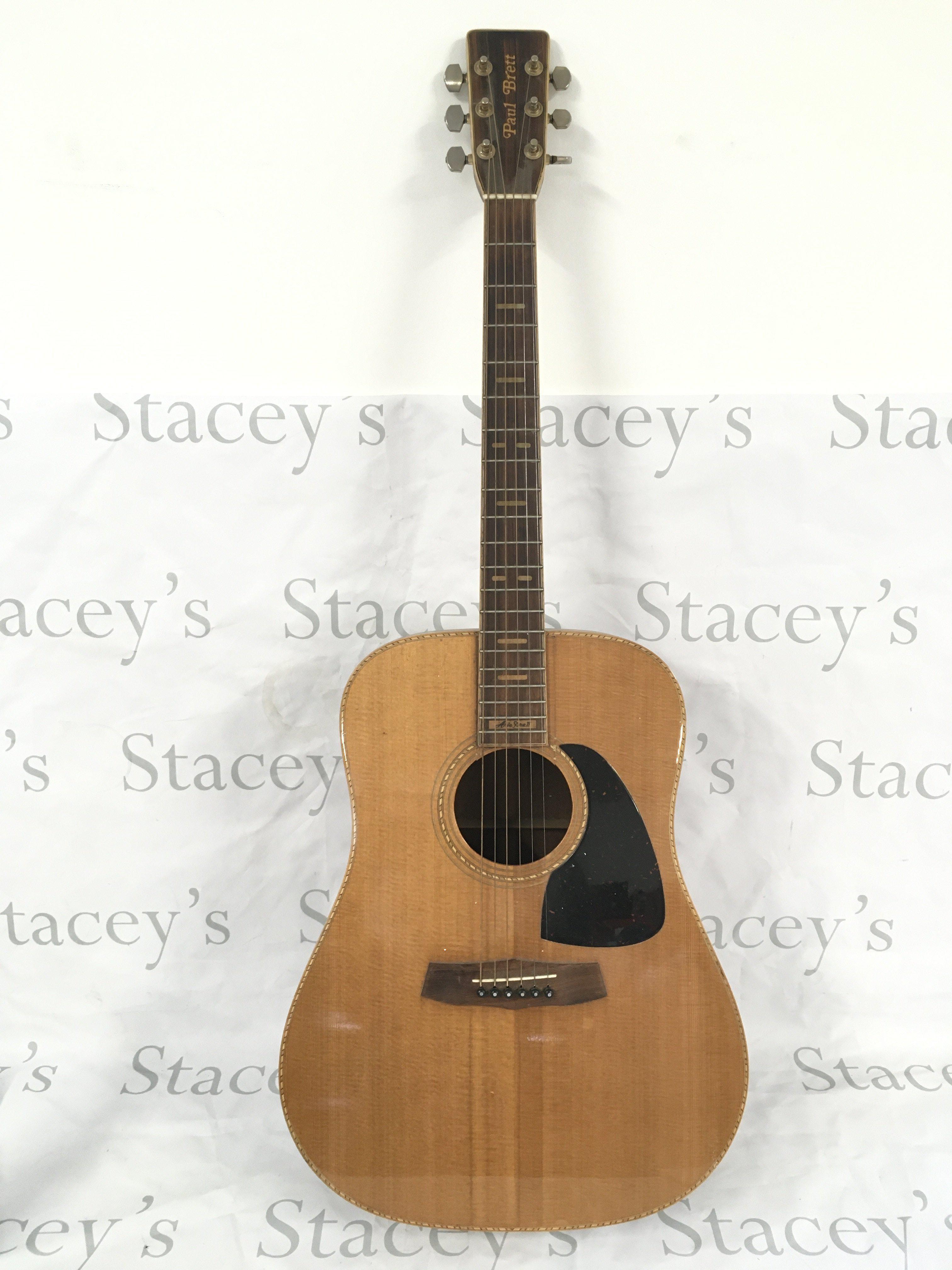 An Aria Pro II Paul Brett signature model acoustic guitar. Comes with a soft carry case.