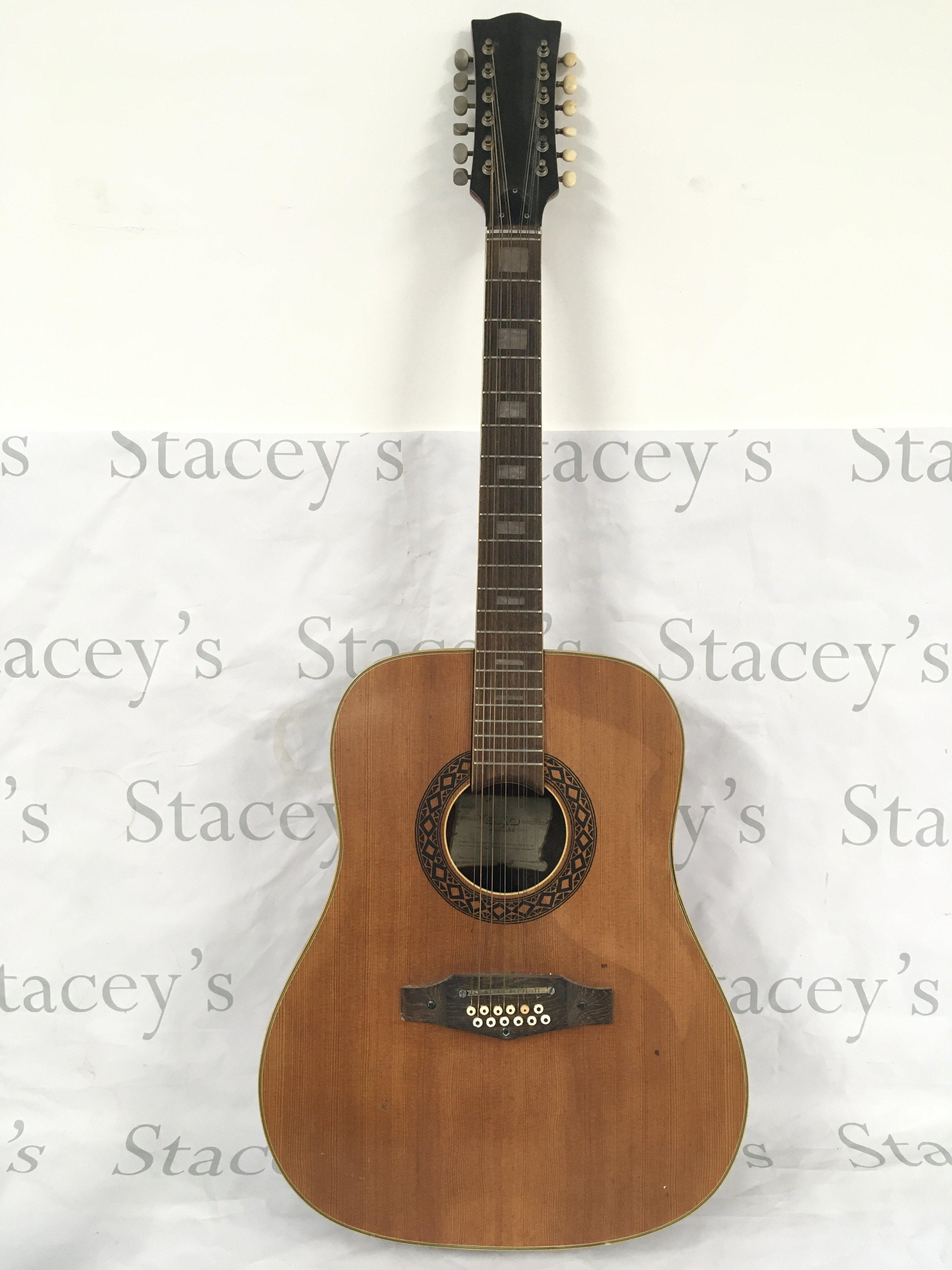 An Eko Ranger 12 string acoustic guitar. No case.