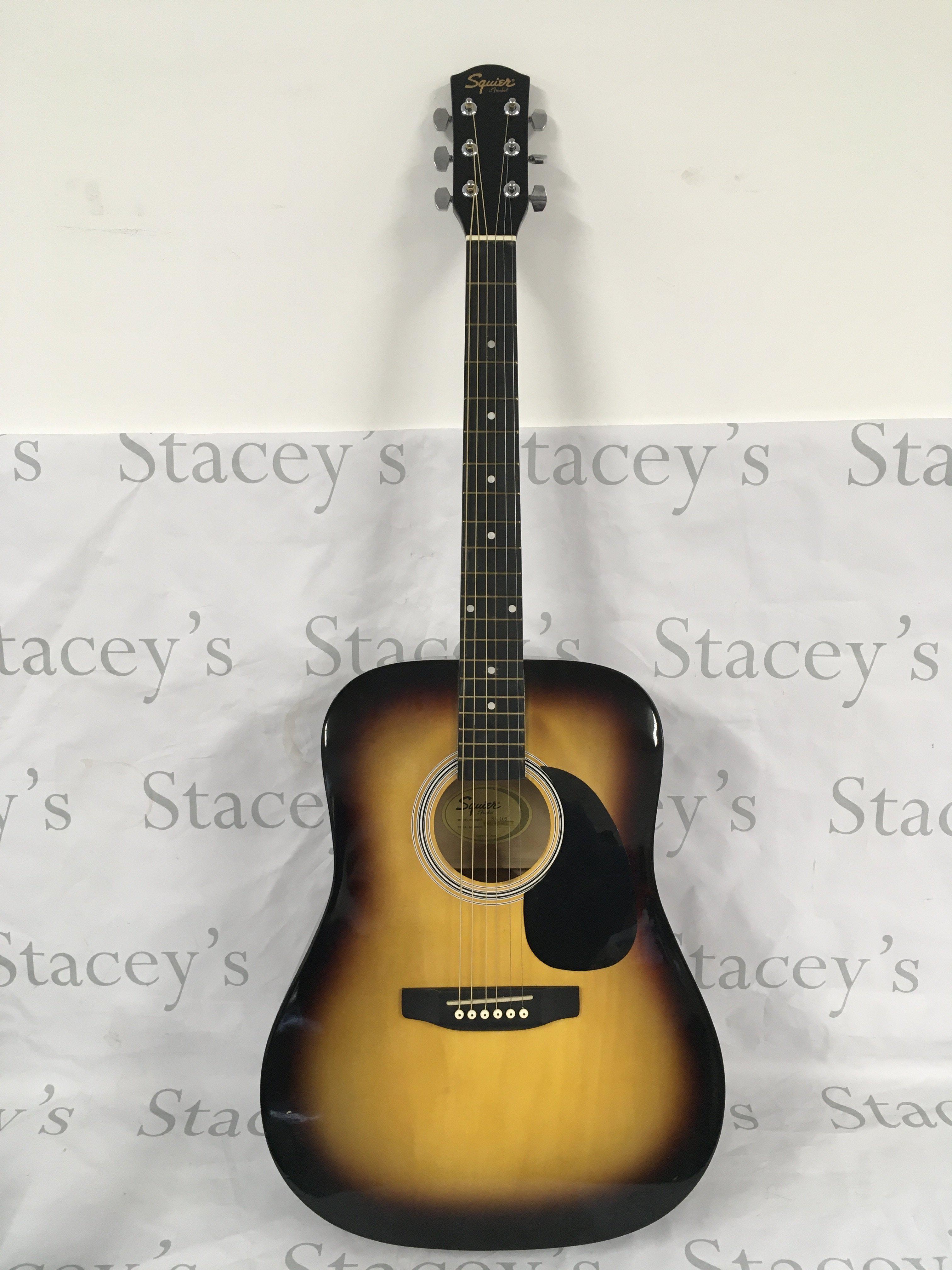 A Fender Squier SA-105 acoustic guitar with soft carry case.