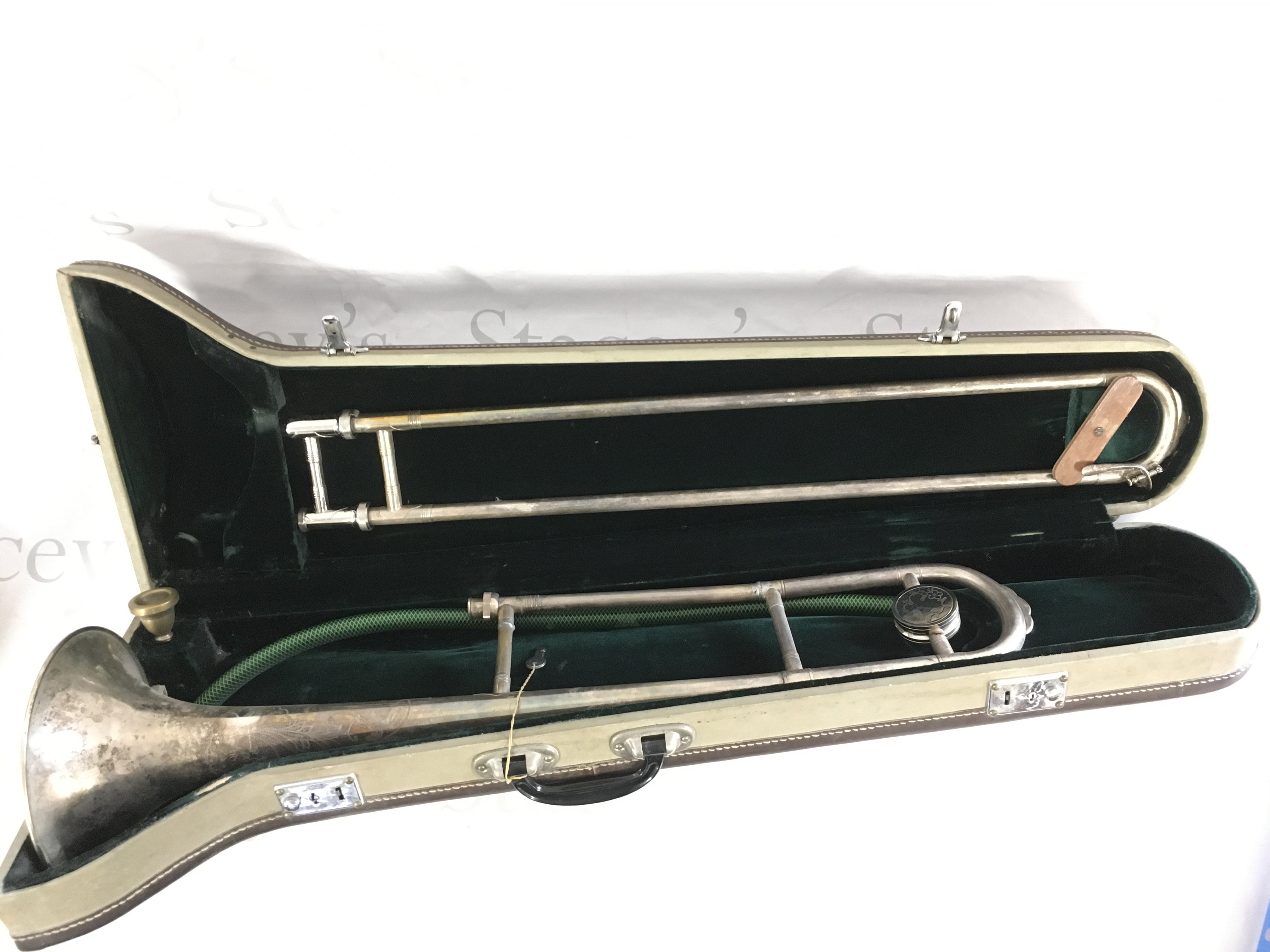 A cased Skylark trombone.