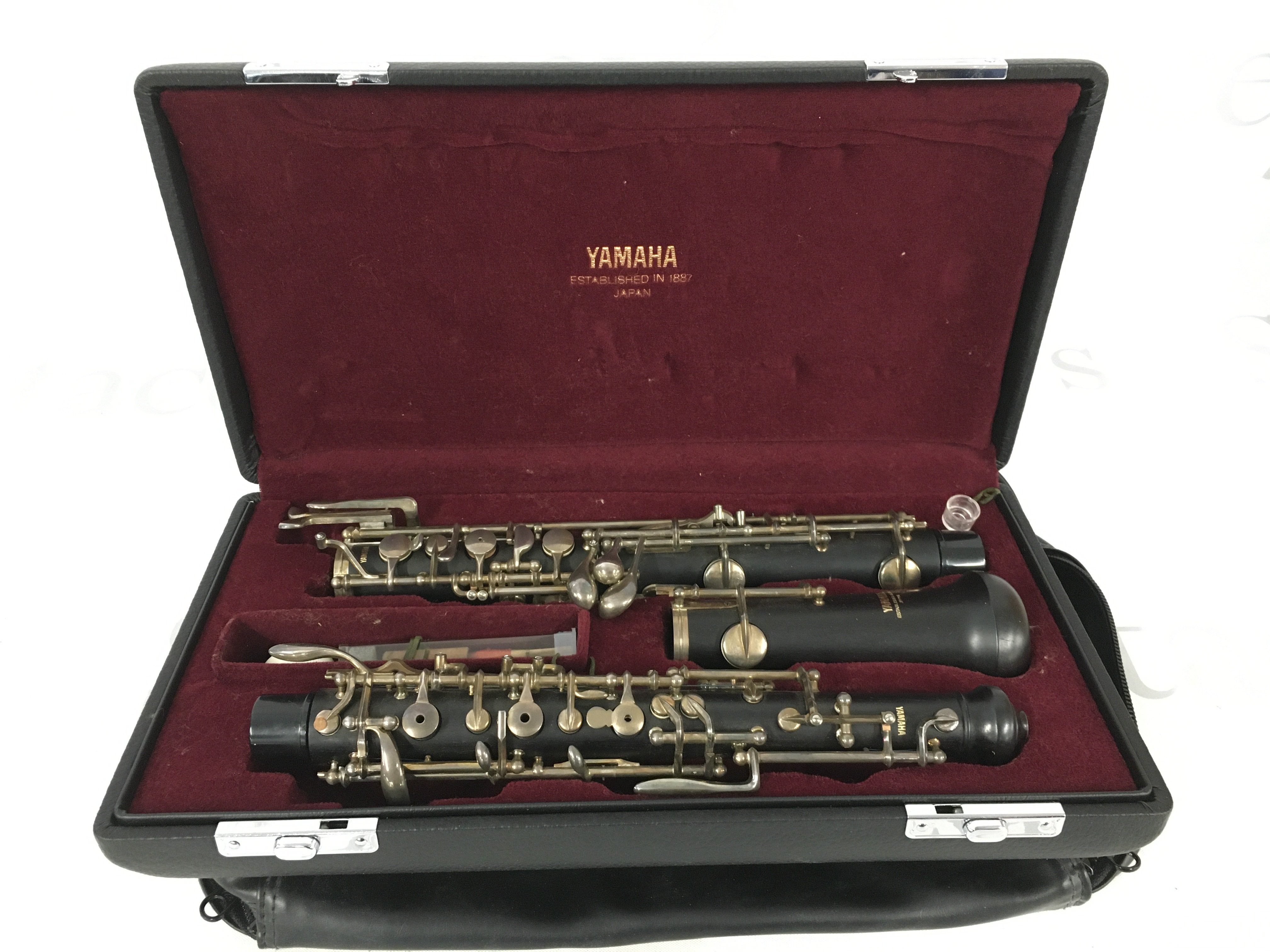 A cased Yamaha clarinet.