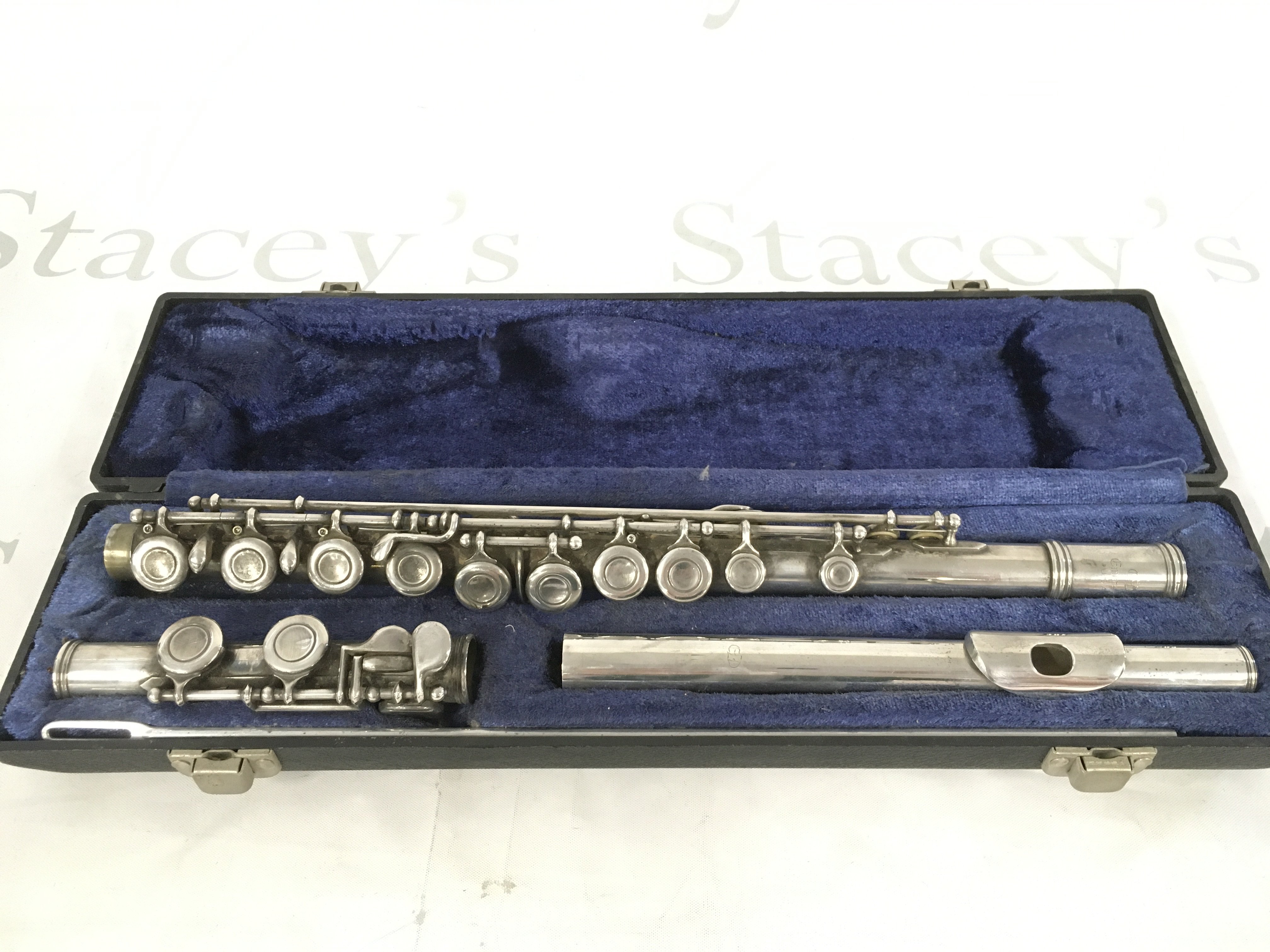 A cased Emerson sterling silver flute.