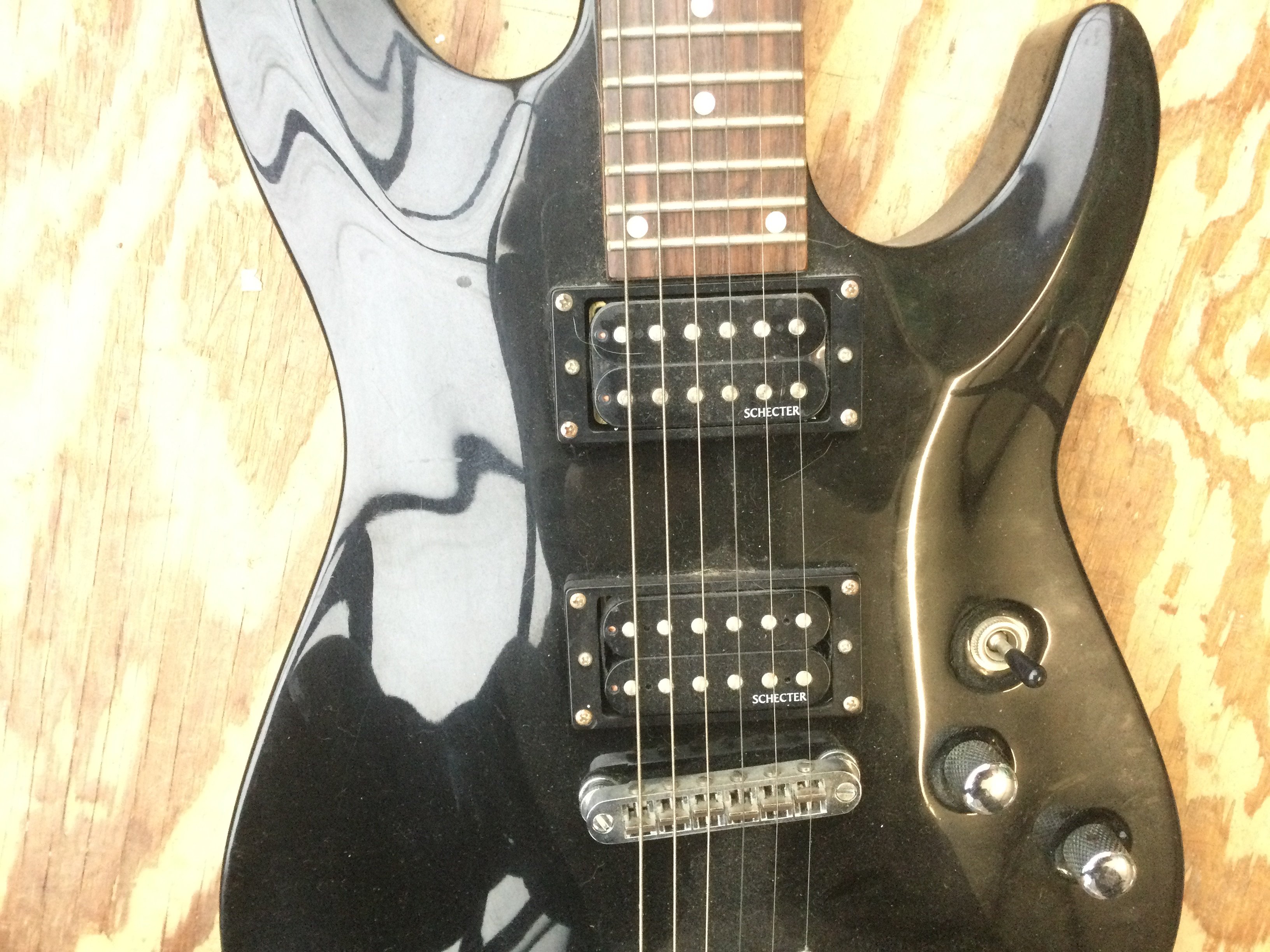 A Schecter Black Hawk BC-1 electric guitar. No case.
