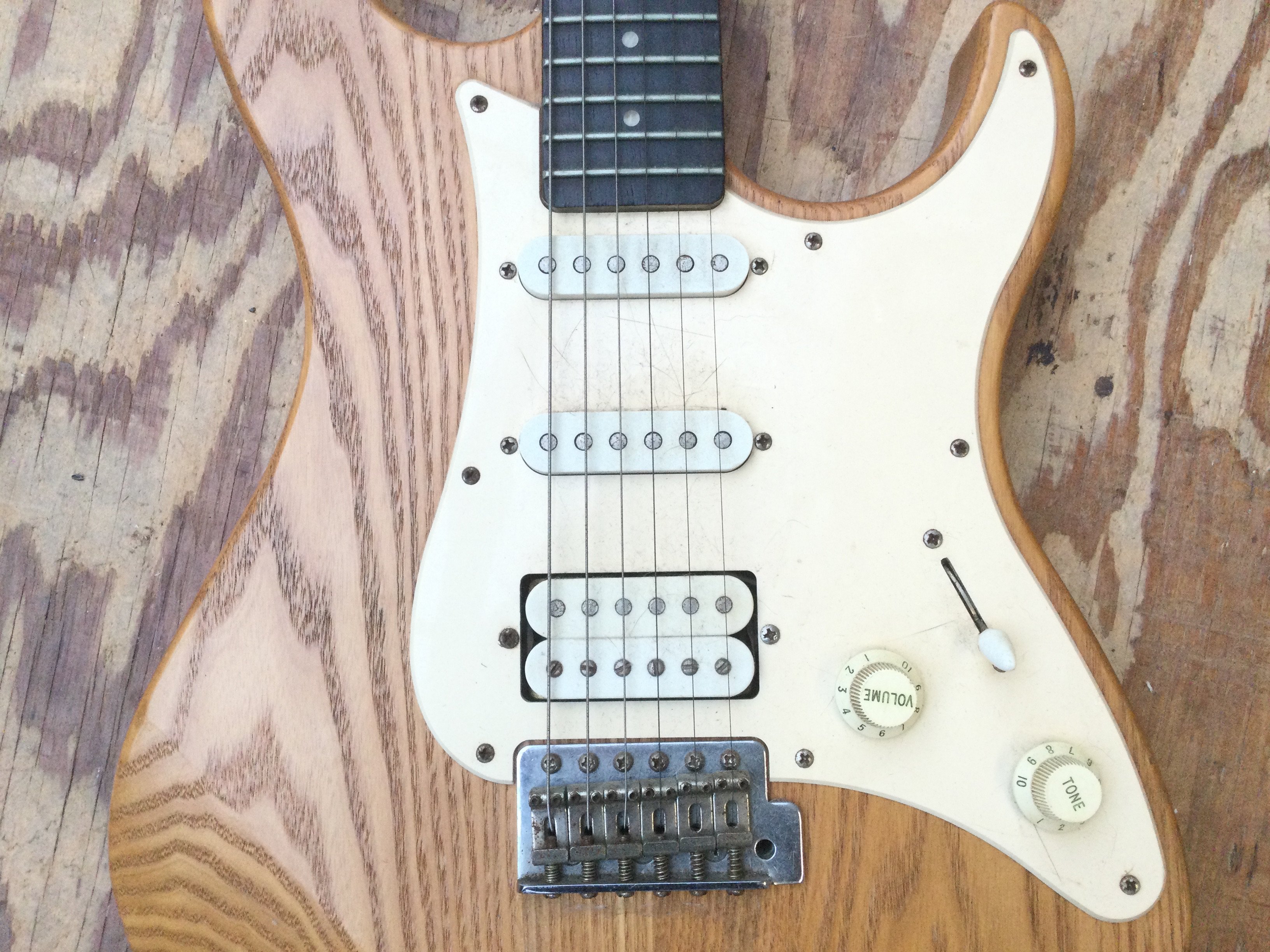 A Yamaha Pacifica electric guitar. No case.