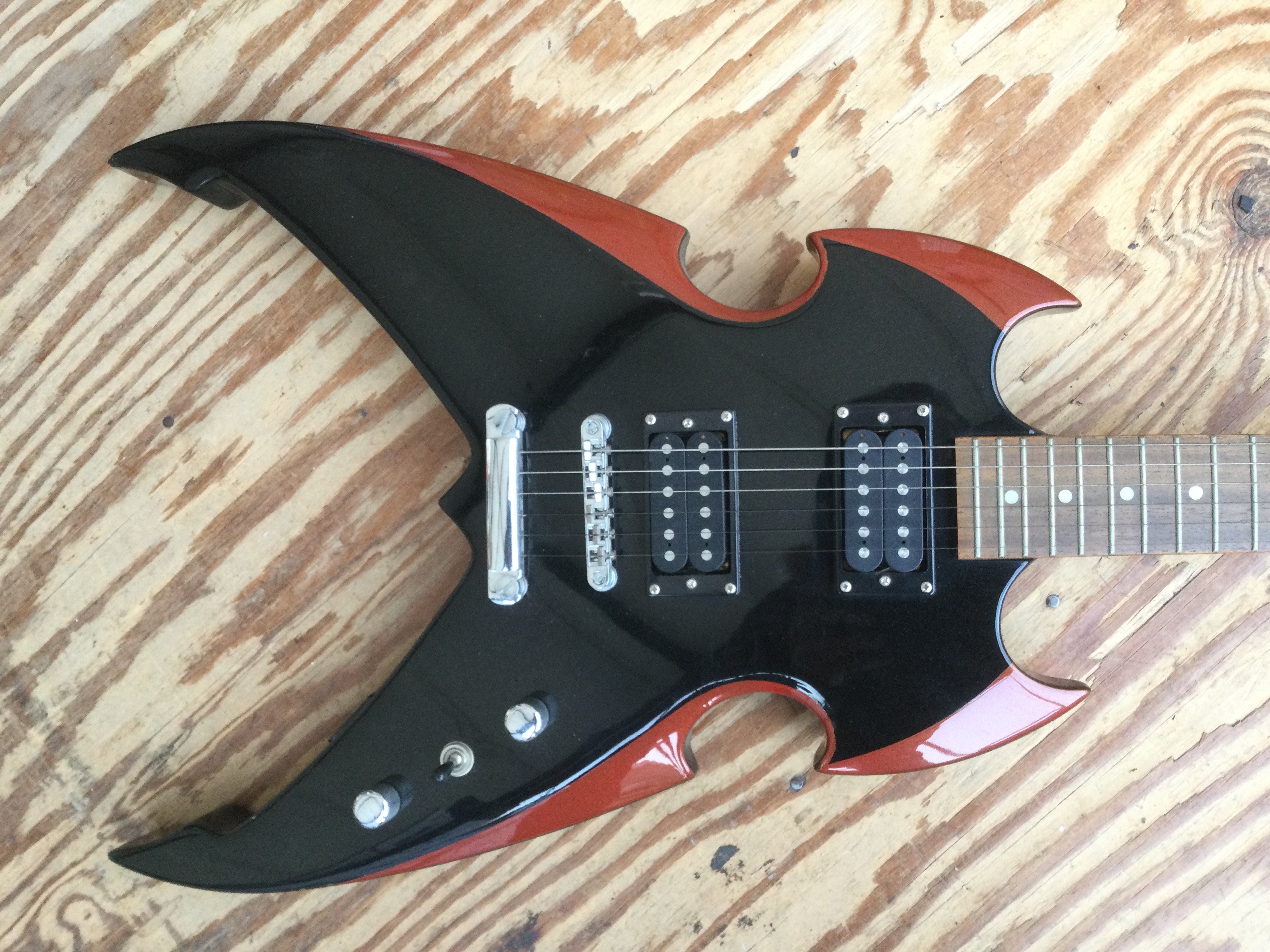 A Silvertone PS-AP1 Paul Stanley Apocalypse electric guitar. No case.