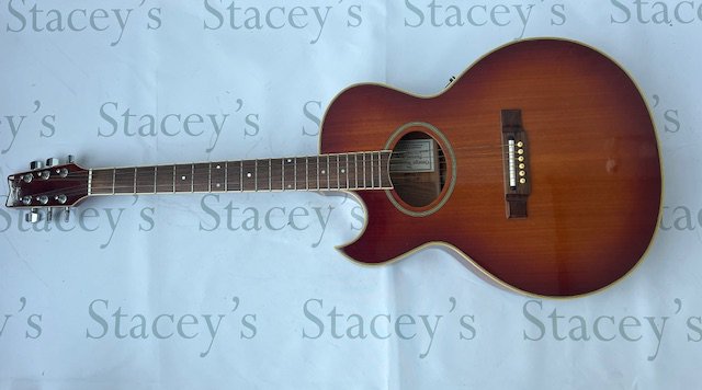 A left handed Washburn Festival Series Electro Acoustic Guitar sunburst finish. Overall good condition. No case.