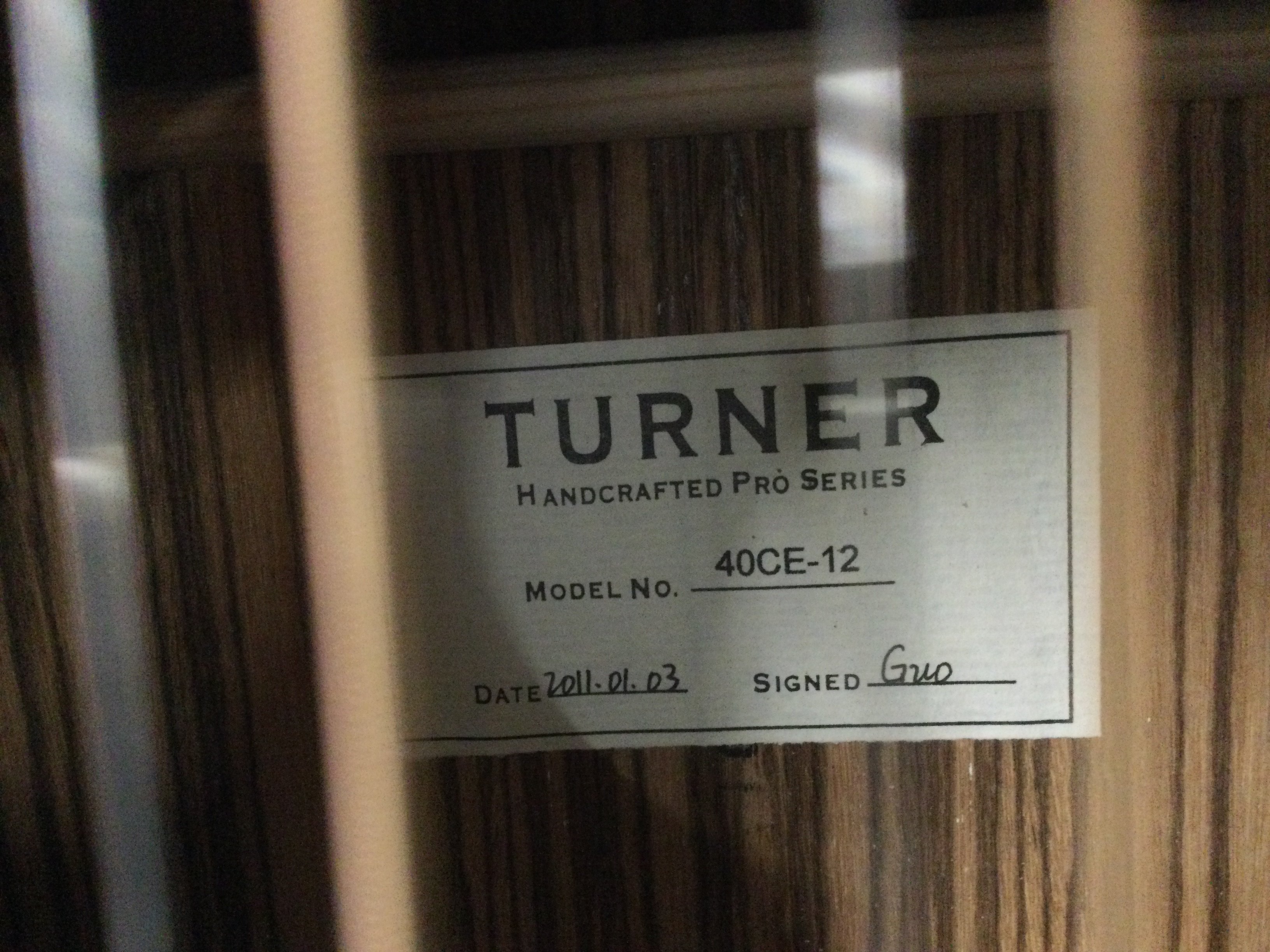 A brand new hand built Turner 40CE-12 12 string electro acoustic guitar with original retail box.