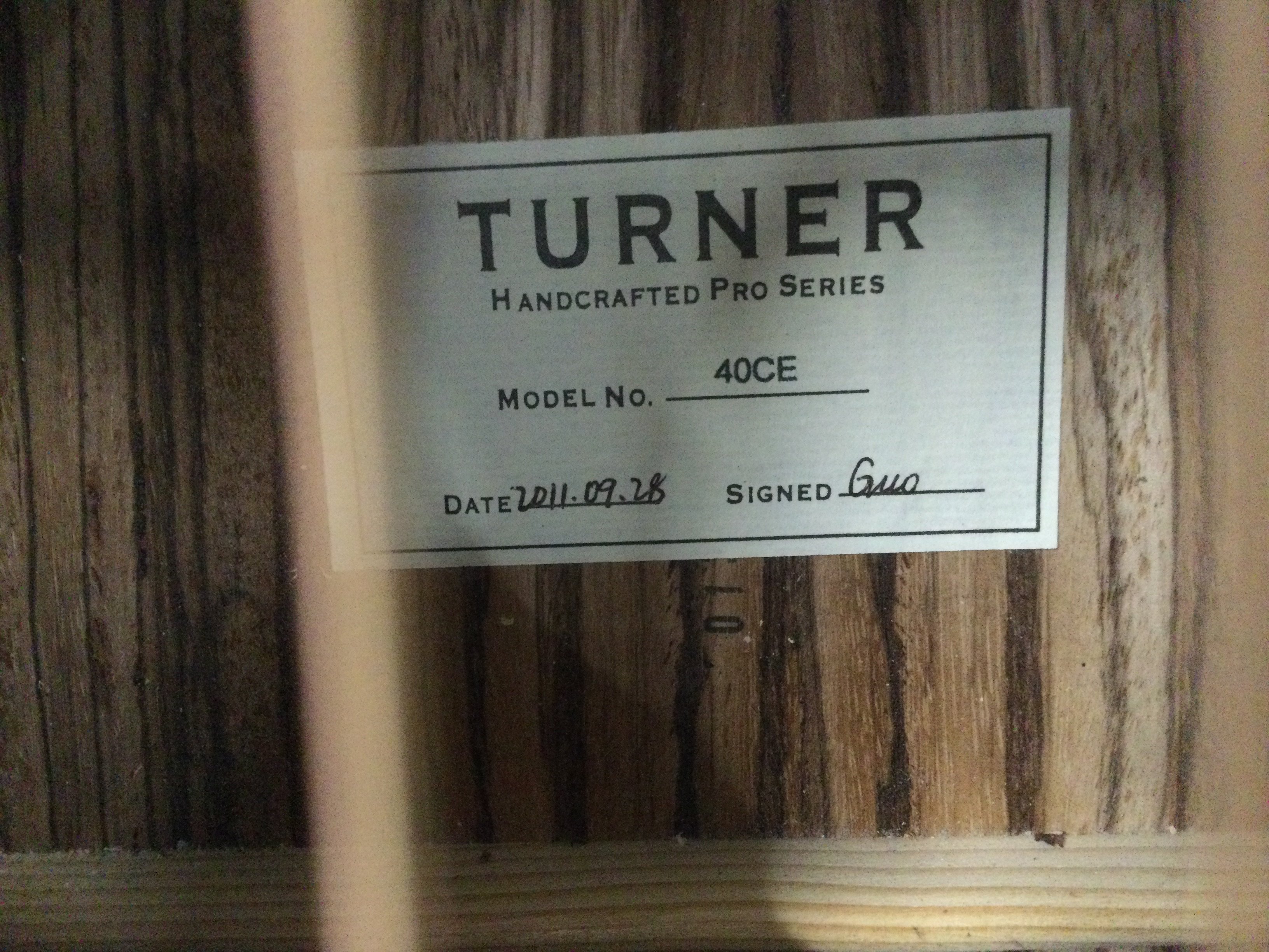 A brand new hand built Turner 40CE electro acoustic guitar with original retail box.