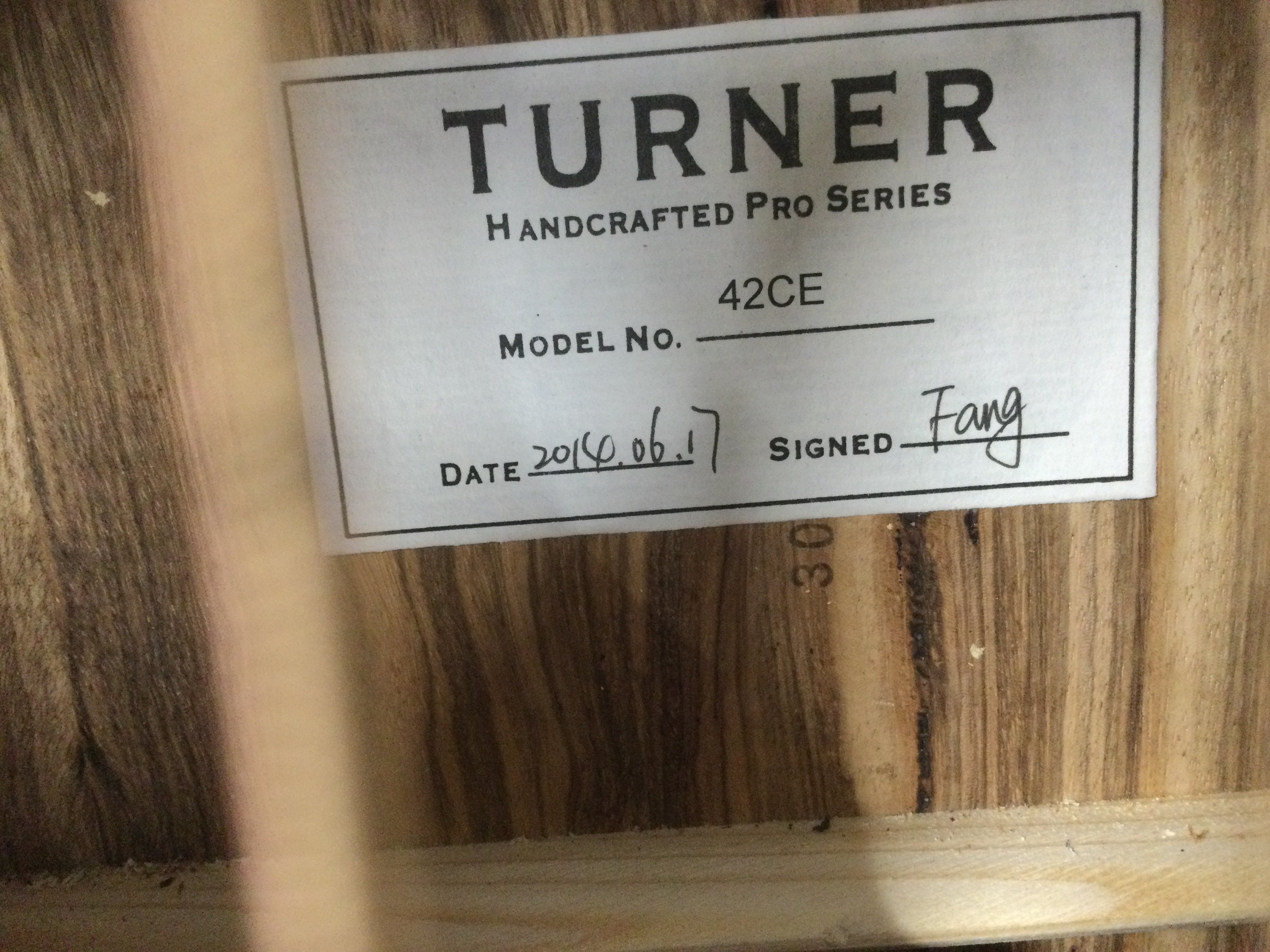A brand new hand built Turner 42CE electro acoustic guitar with original retail box.