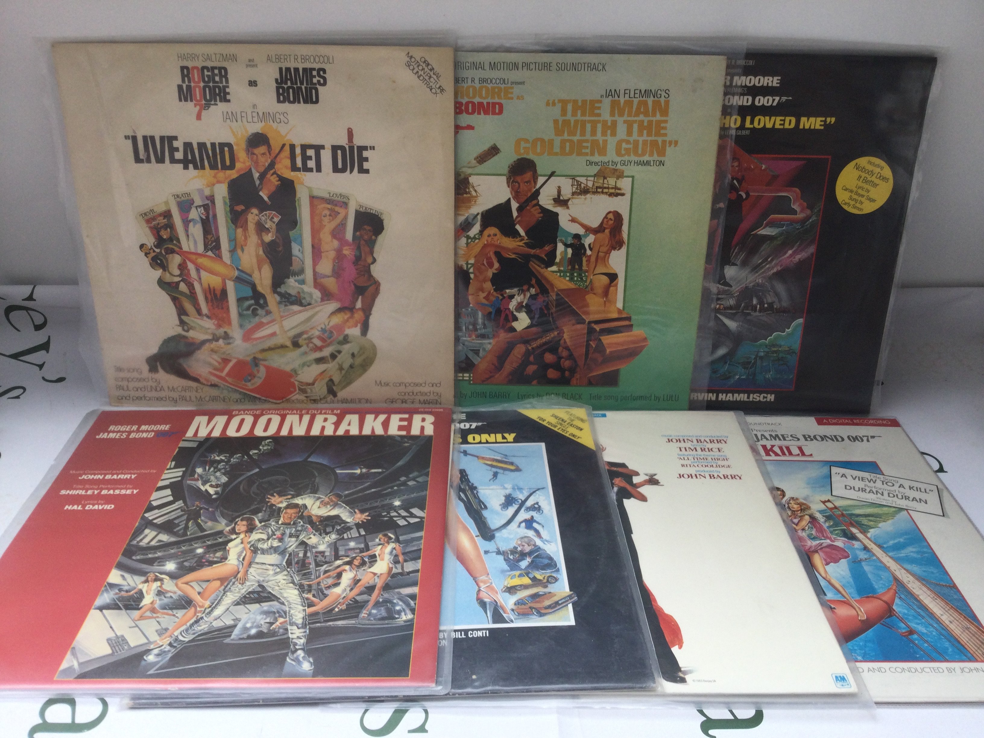 Seven James Bond soundtrack LPs comprising Live And Let Die, For Your Eyes Only and others.