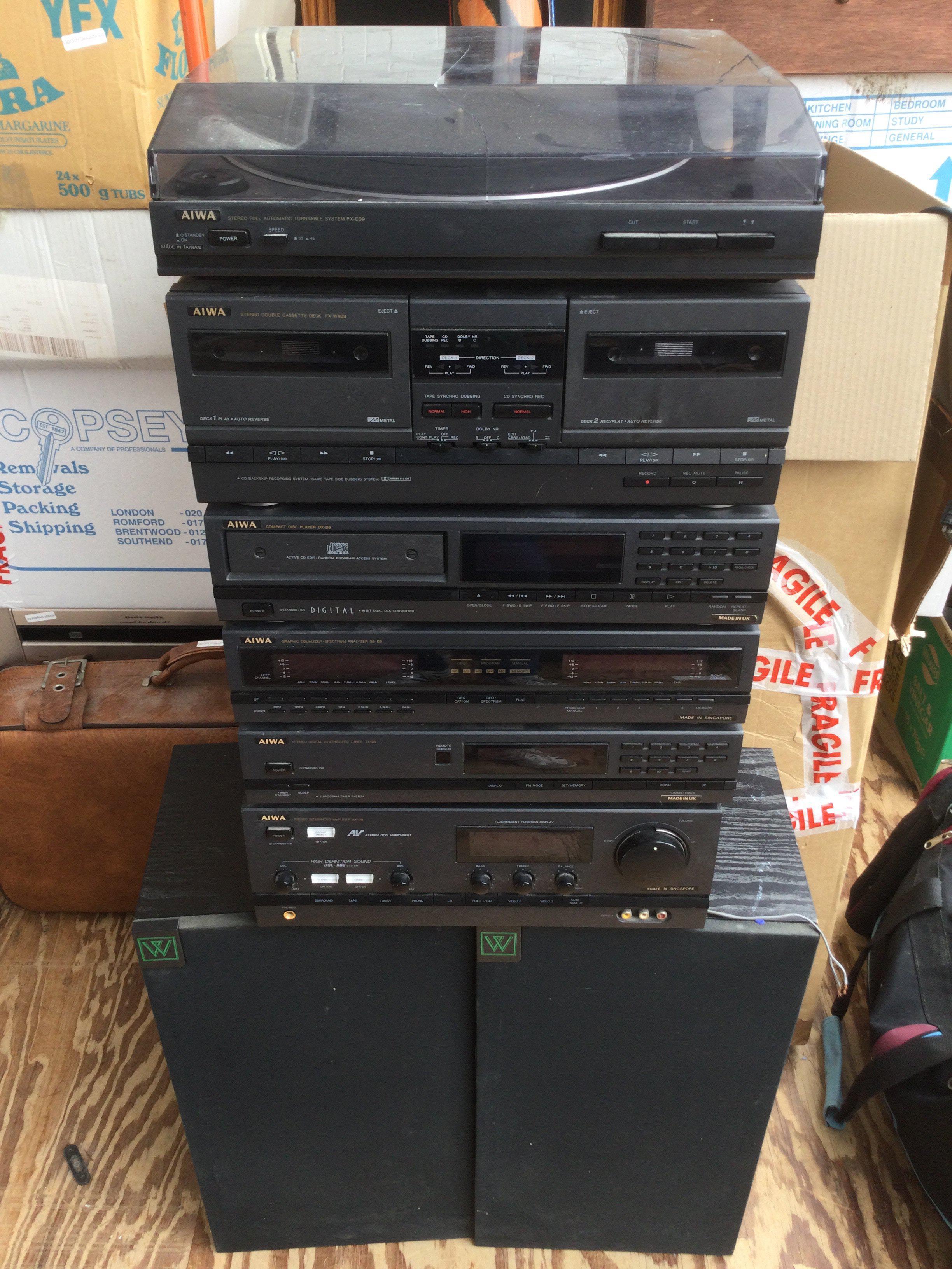 An Aiwa stacking HiFi comprising a PX-ED9 turntable, MXD9 amplifier etc plus a pair of floor standing Delta speakers.