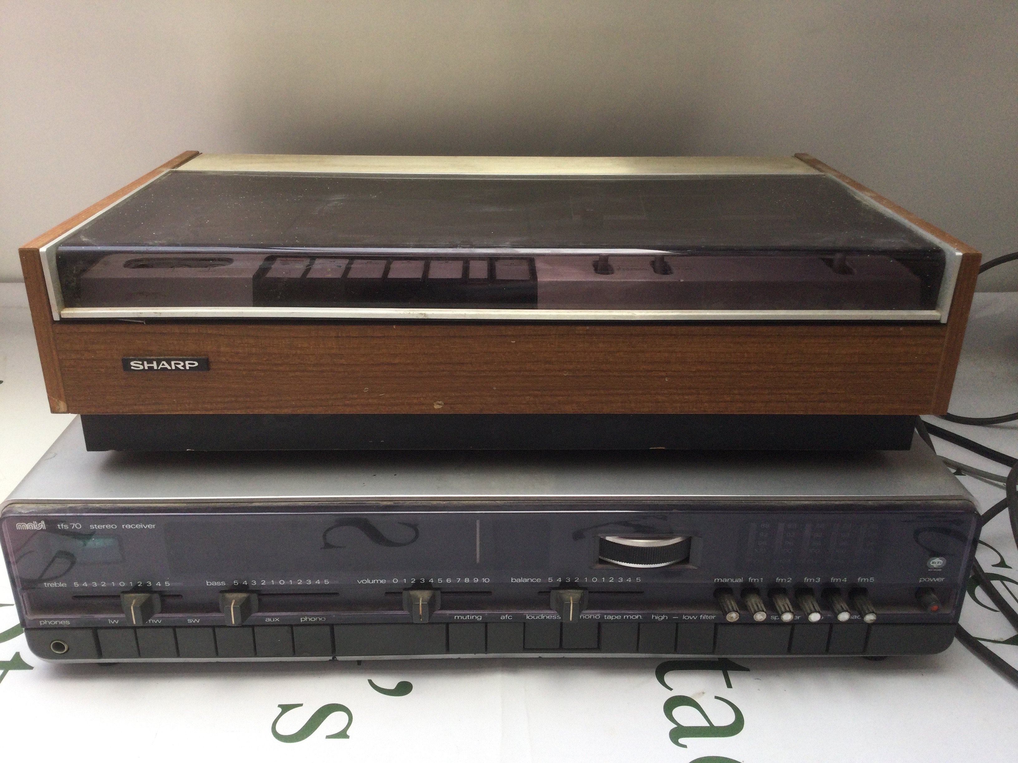 A Garrard Zero 100SB turntable (no lid), Sharp cassette deck and a Teleton TFS 70 stereo receiver (3).