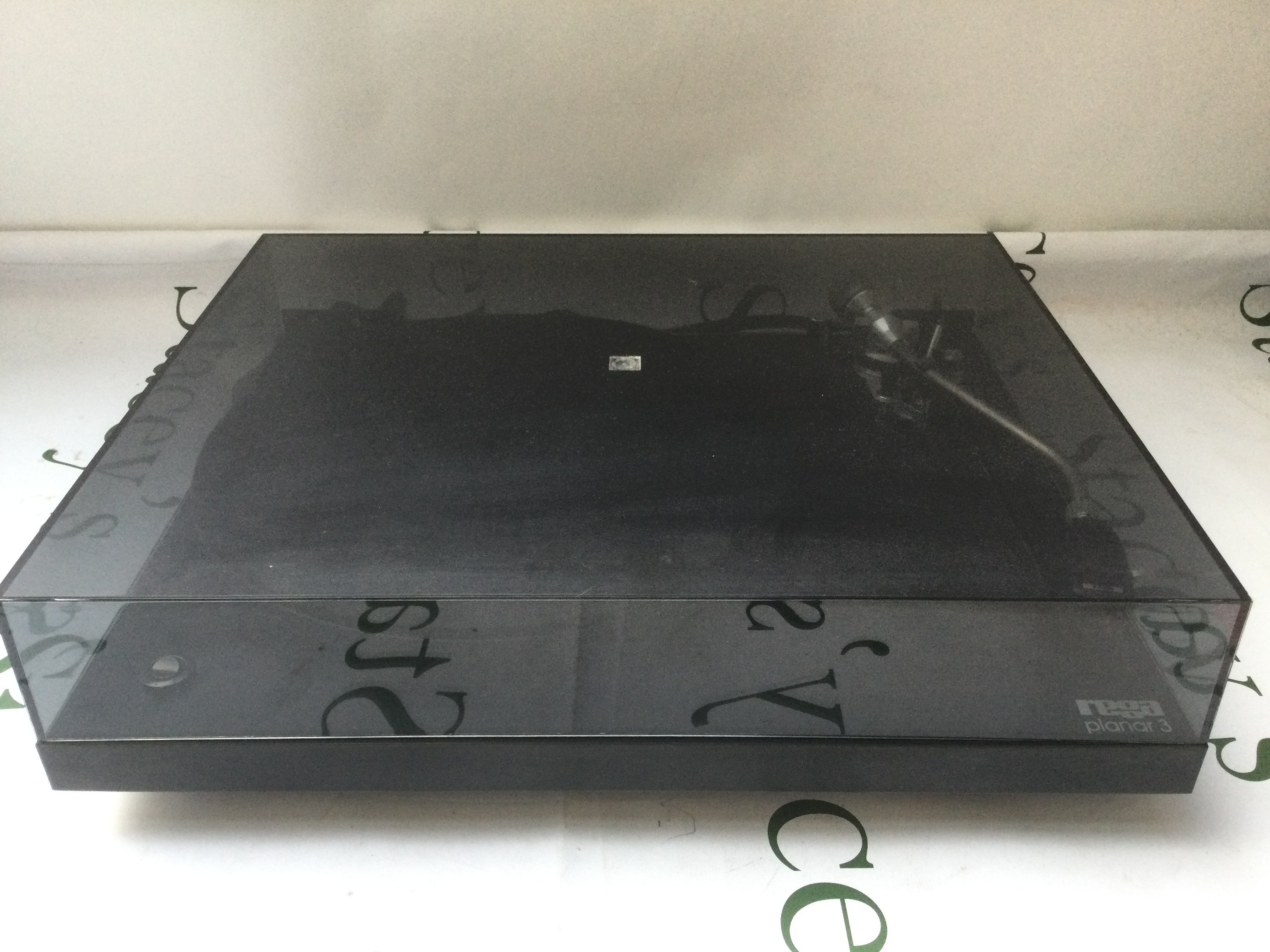 A boxed Rega Planar 3 record player.