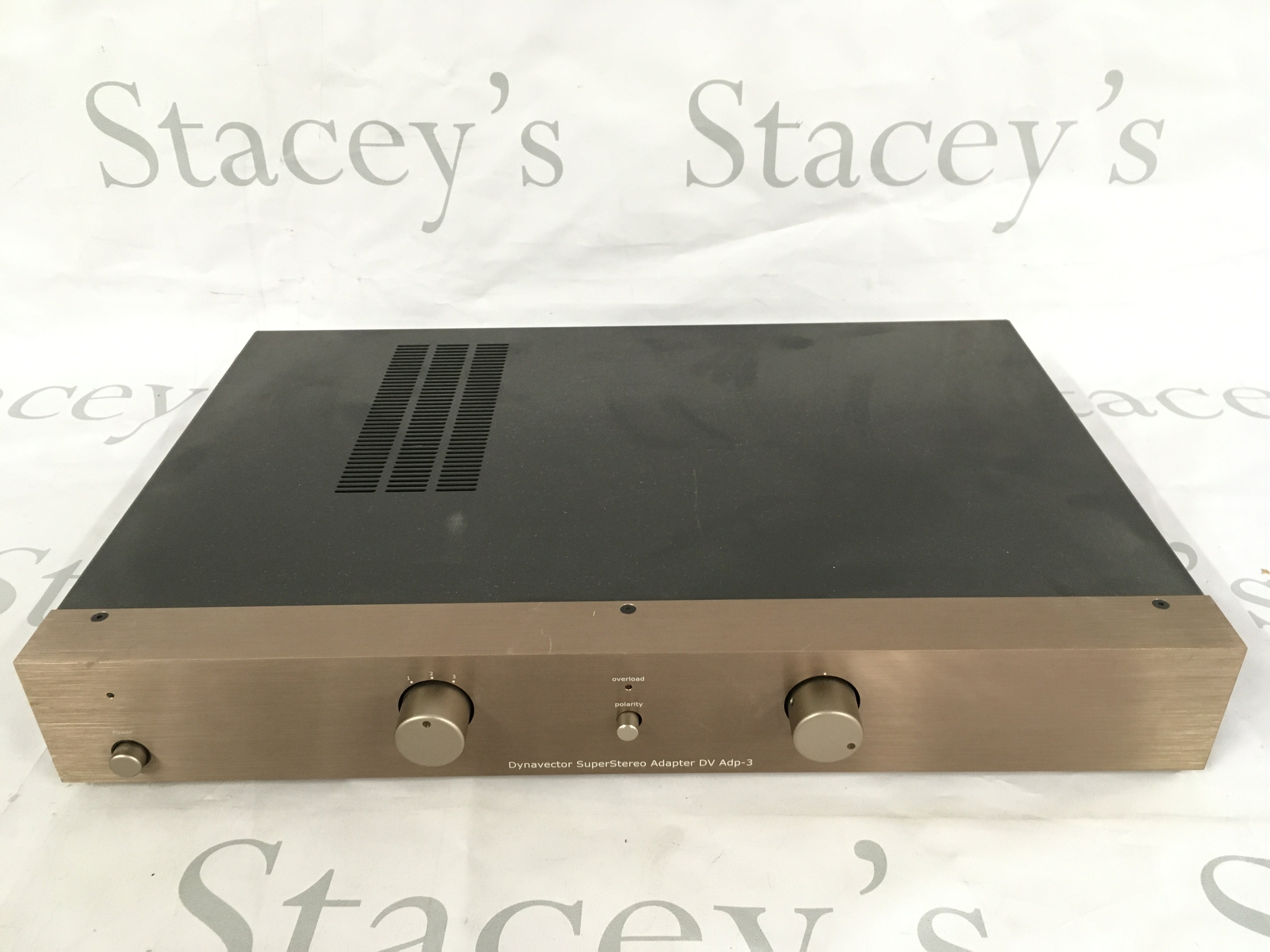 A boxed Dynavector Super Stereo adapter ADP-3. Comes with purchase receipt, booklets, operation manual etc.