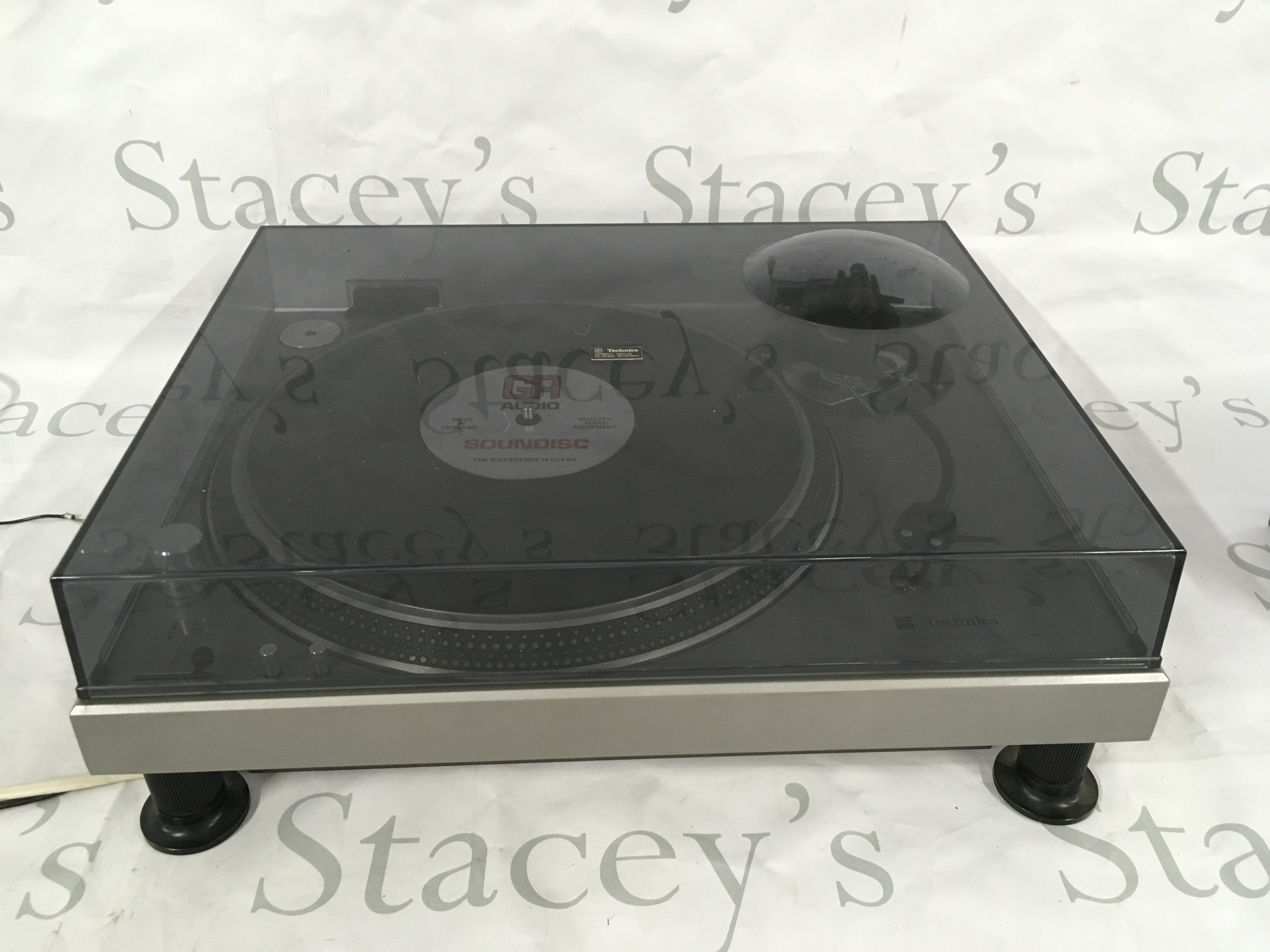 A boxed Technics SL-120 direct drive turntable. The SL-120 originally came without a tonearm section and now comes fitted with an SME Series 3 (3009) pick up arm and Shure VST-5 cartridge. Boxes and manuals included.