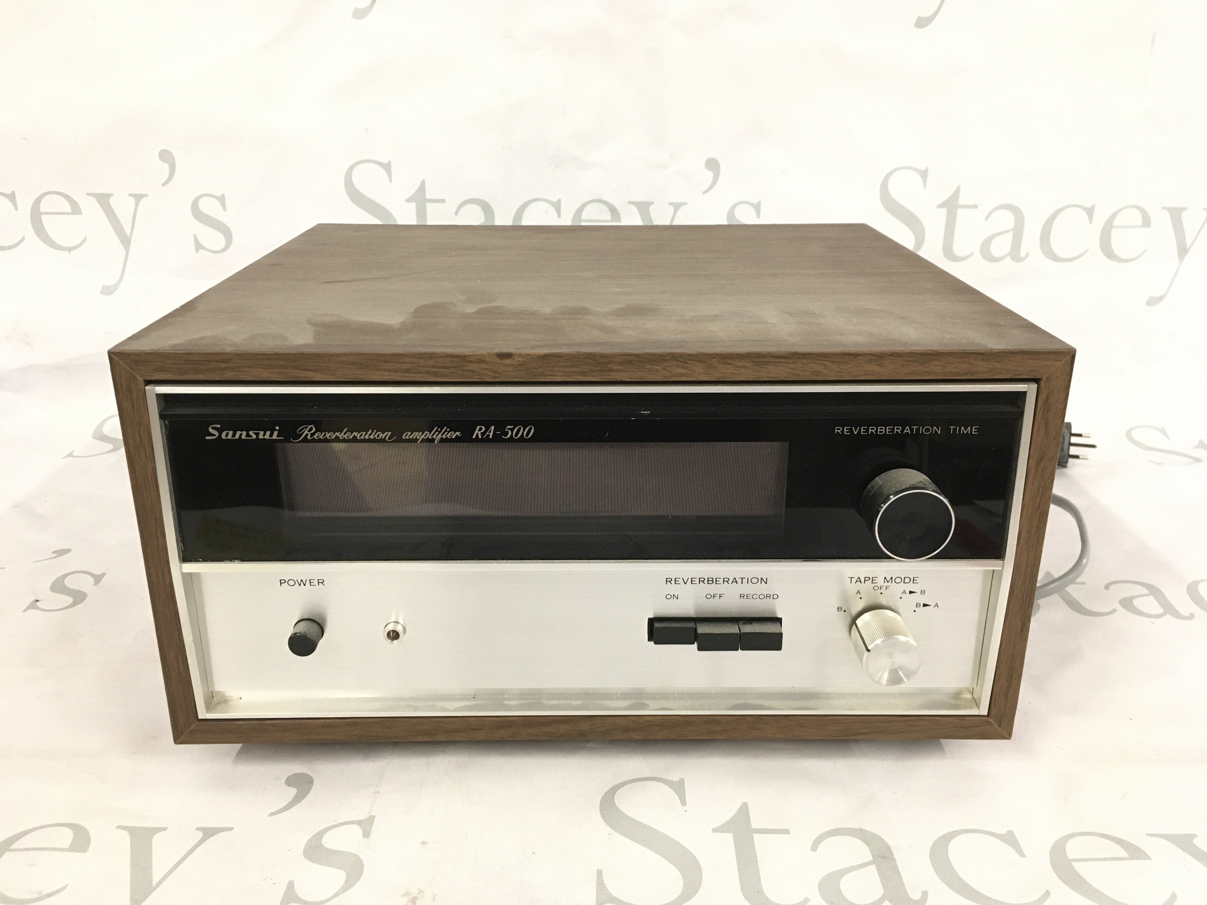 A boxed Sansui RA-500 reverberation amplifier. Comes with operating manual.