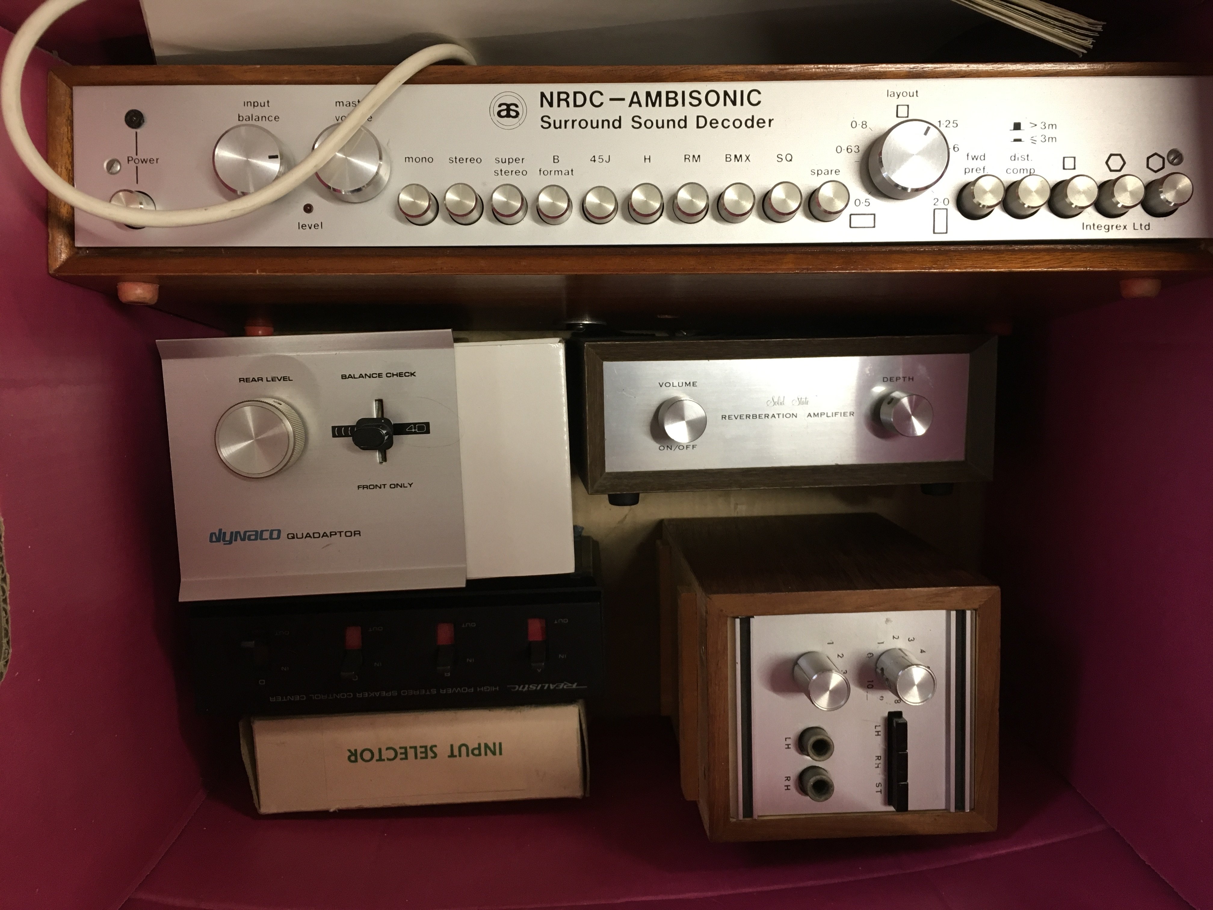 A collection of HiFi separates comprising a Dyanaco quadraptor, Solid State Reverberation amplifier, Realistic High Power Stereo Speaker Control Centre, NRDC Ambisonic Sound Decoder with manual, a boxed QAS input selector and a PSG03927 Pro Signal audio pre amplifier.