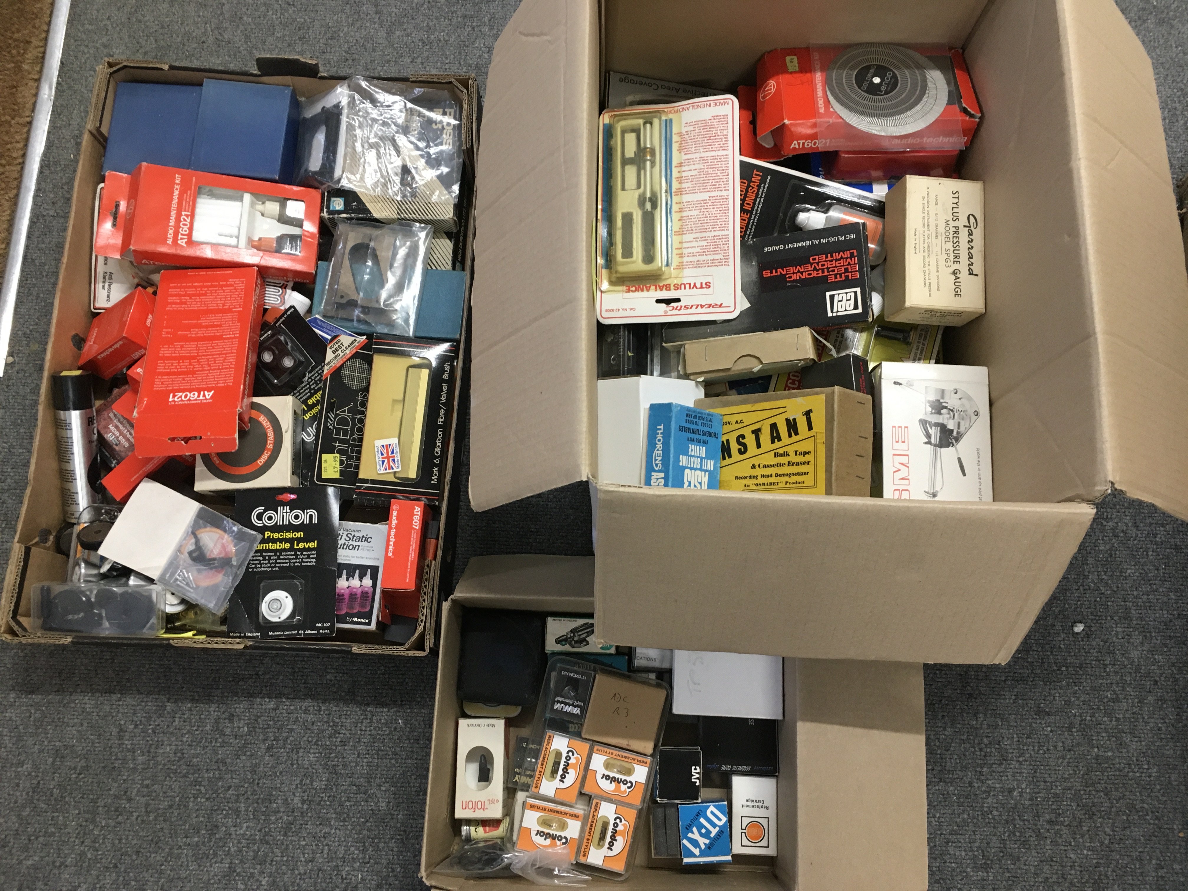 Two boxes of HiGi spares and accessories including pre amps, Stylus/cartridges etc.