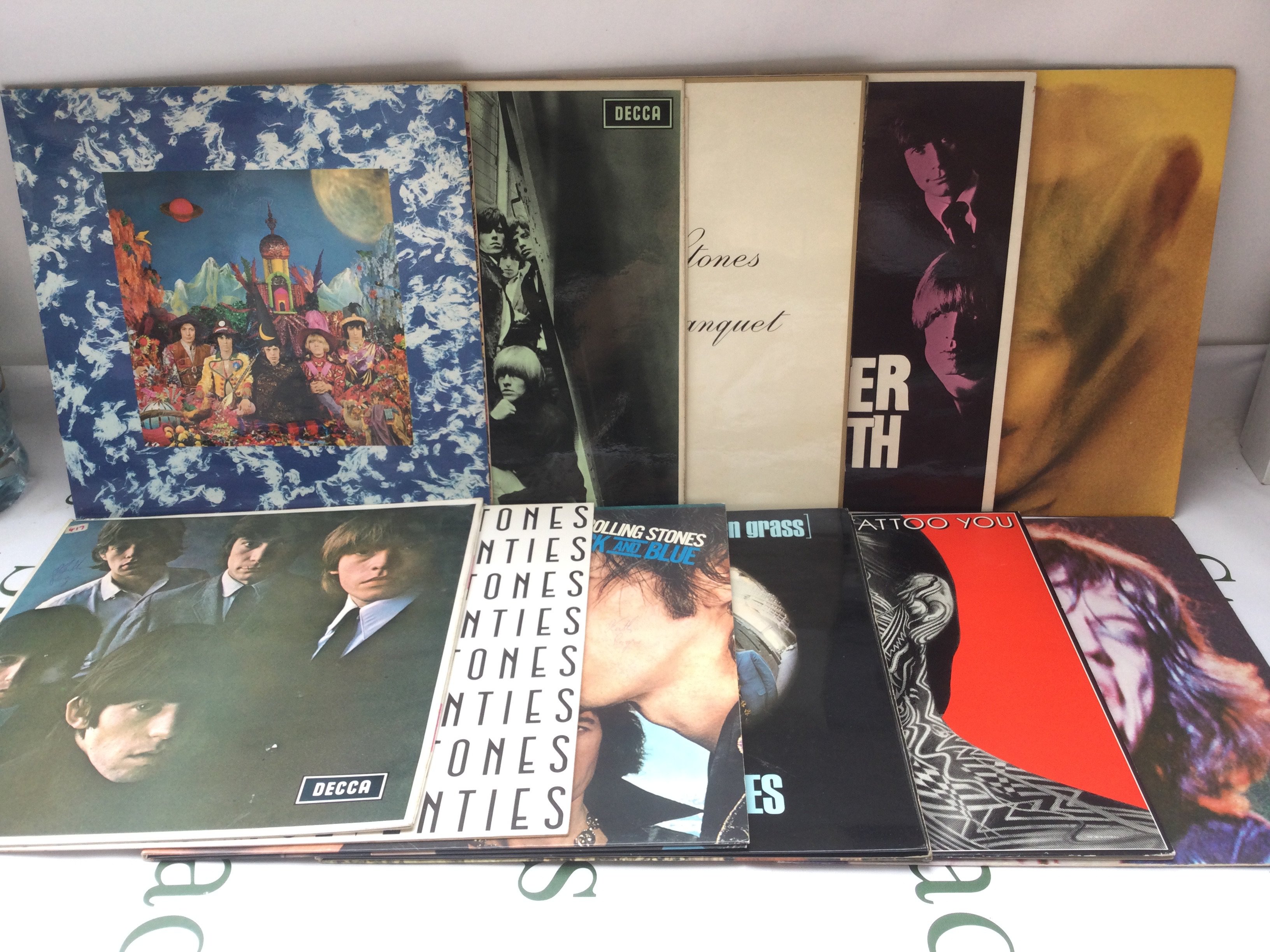 Eleven Rolling Stones LPs comprising Their Satanic Majesties Request, Beggar's Banquet, Aftermath and others.