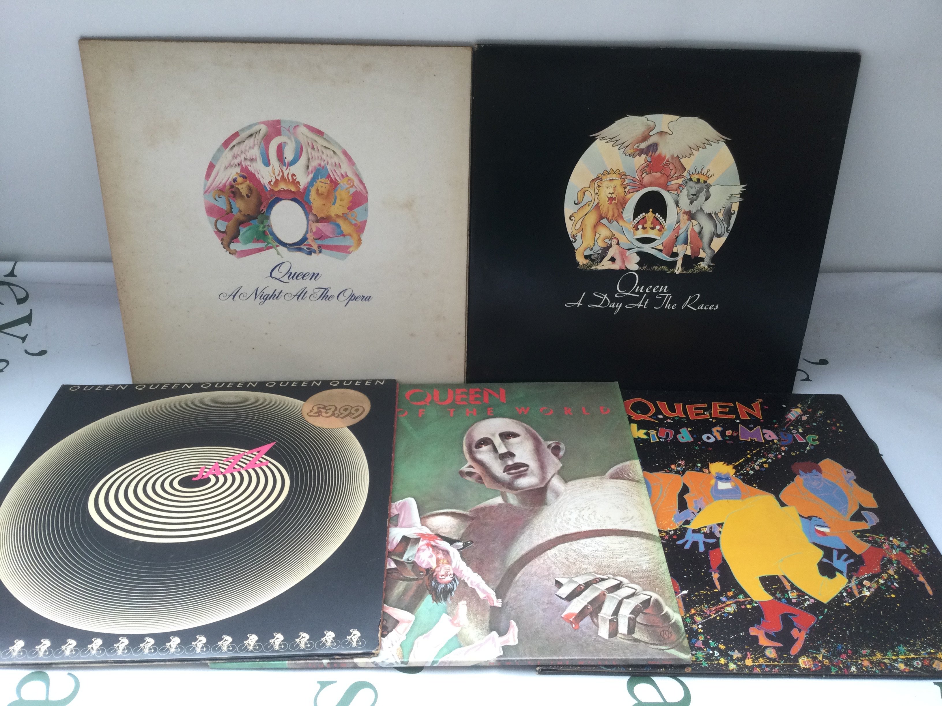 Five Queen LPs comprising A Night At The Opera, News Of The World and others.