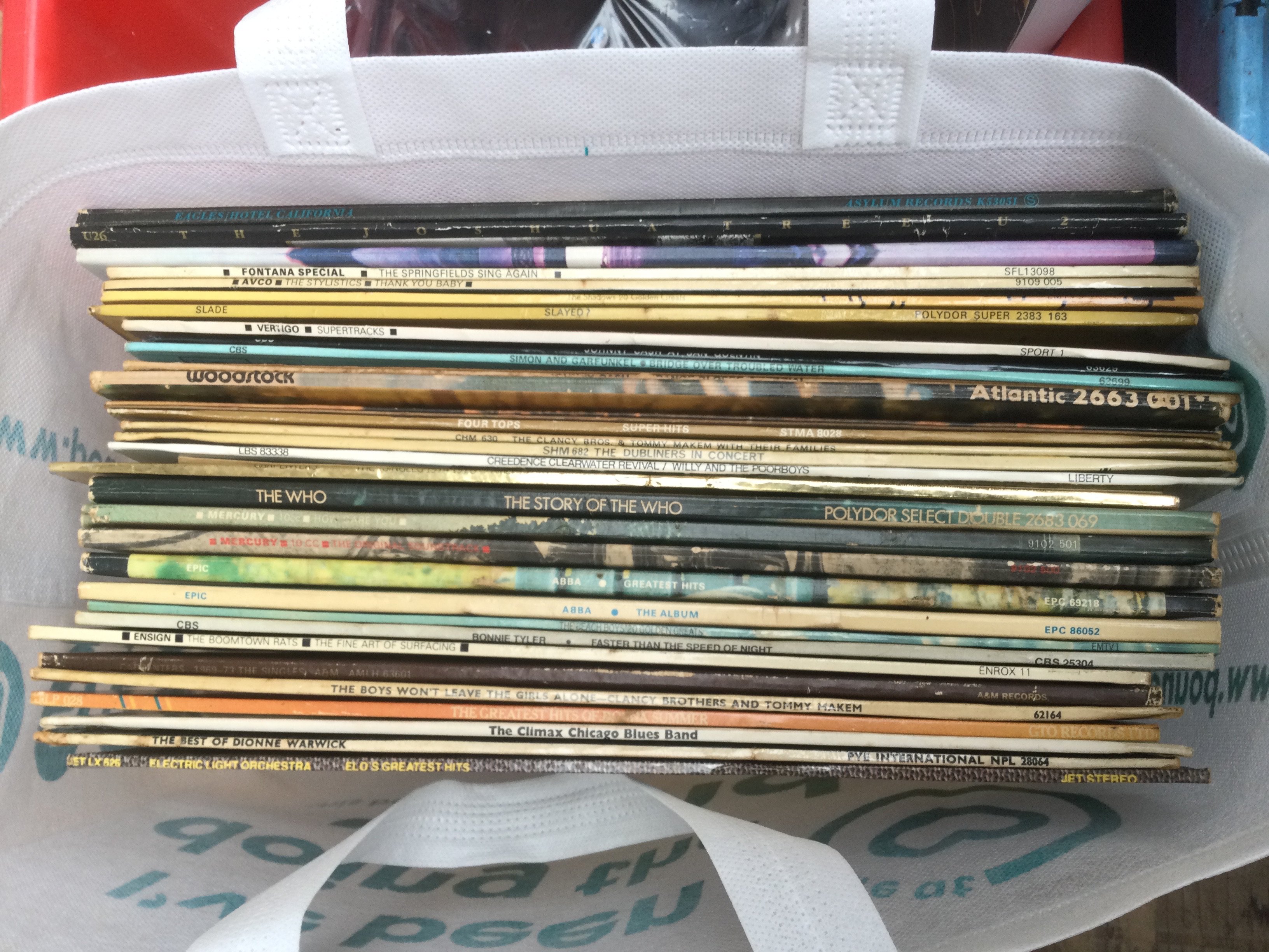 A collection of LPs by various artists including The Who, The Nice and others.