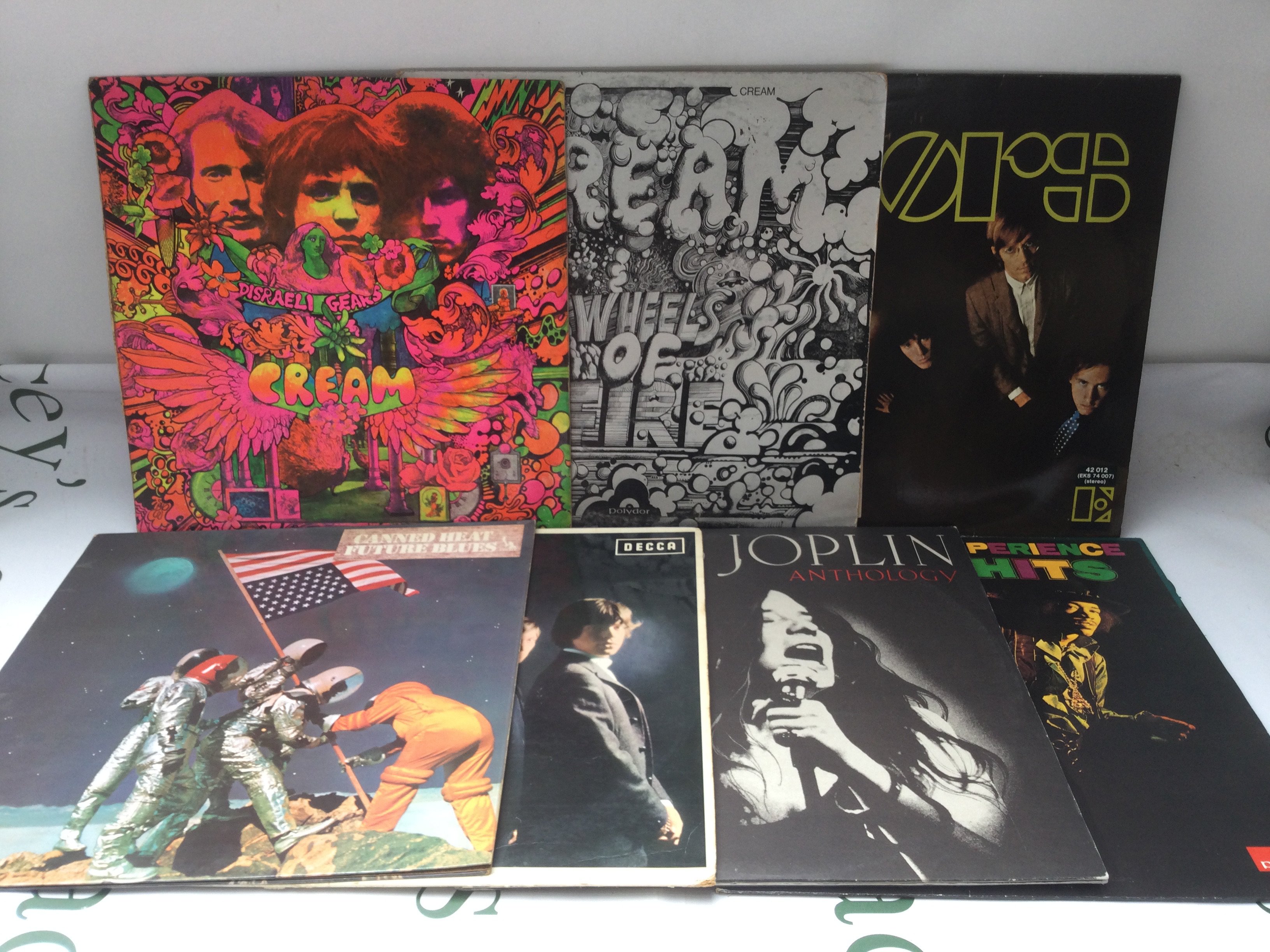 Fifteen LPs by various artists including The Doors, Cream, Jimi Hendrix and others.
