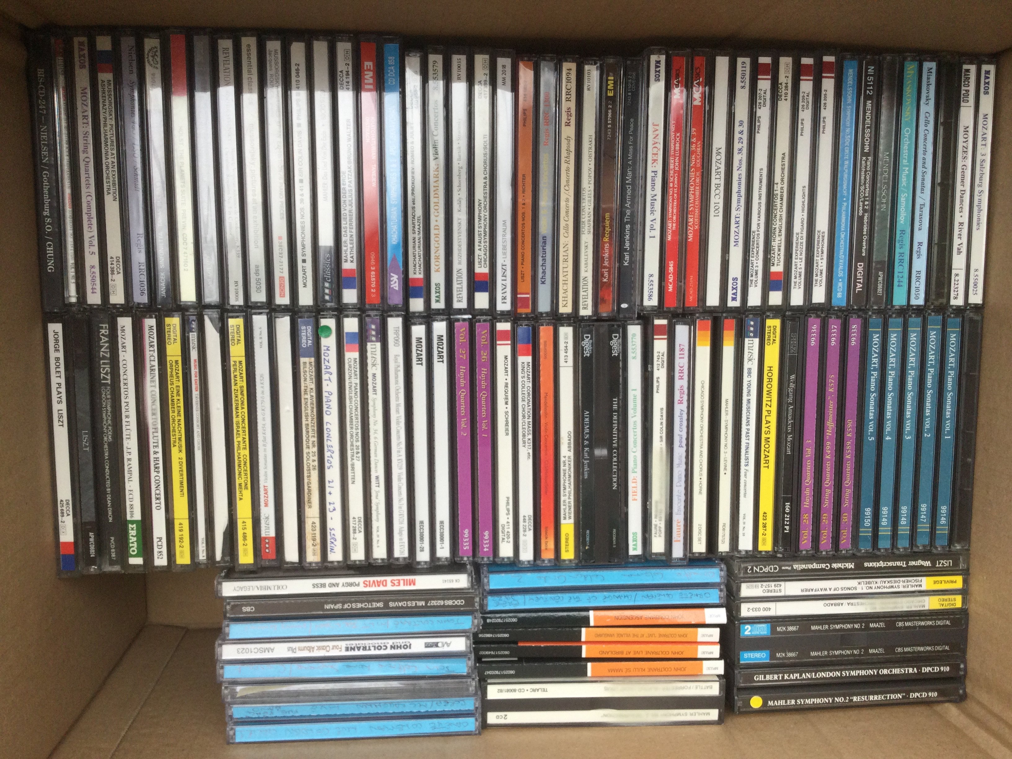 Five boxes of jazz and classical music CDs.