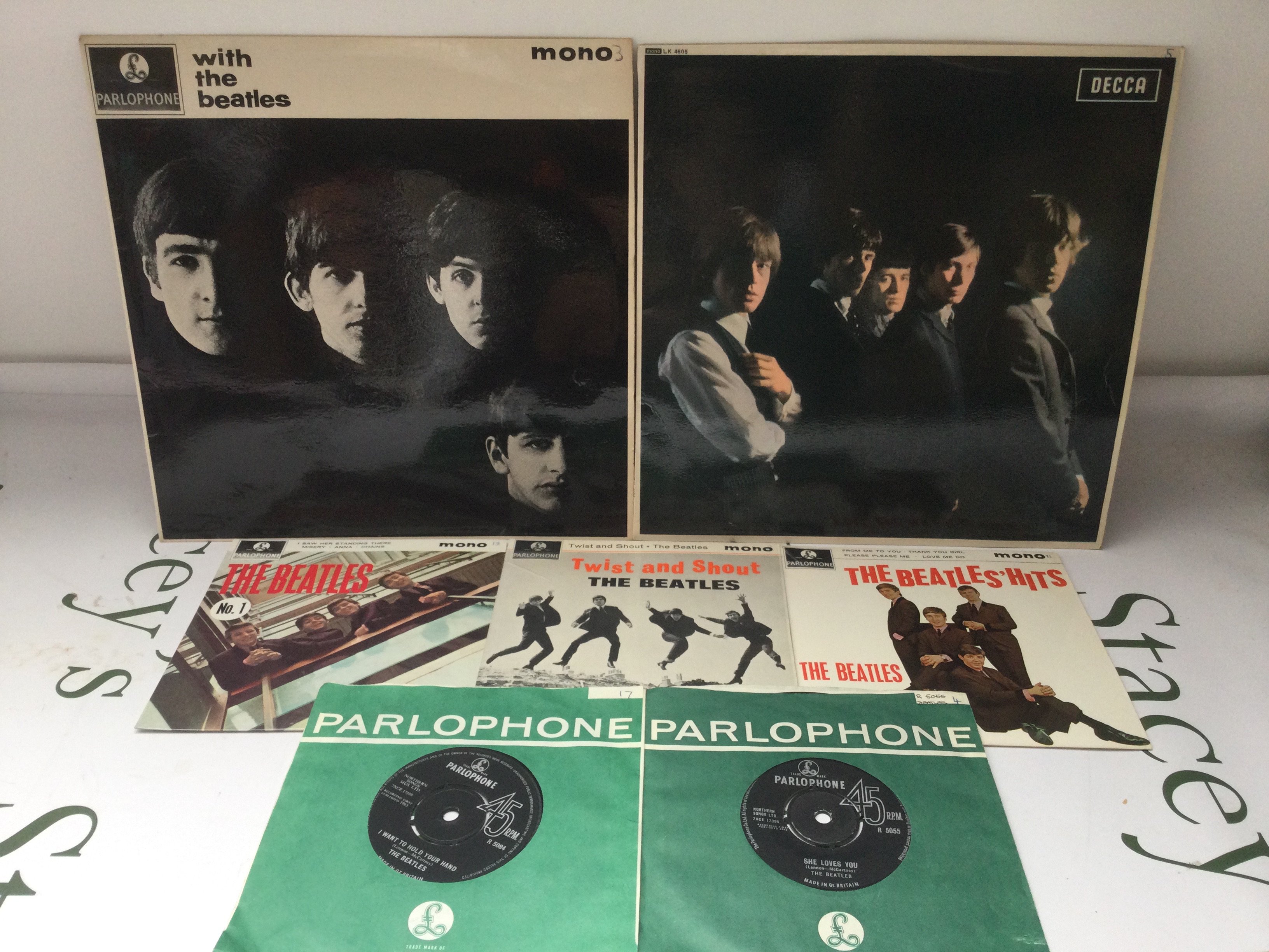 A first UK mono pressing of With The Beatles, The Rolling Stones debut LP plus three Beatles EPs snd two 7" singles. All vinyl is Ex. Stunning condition given their age.