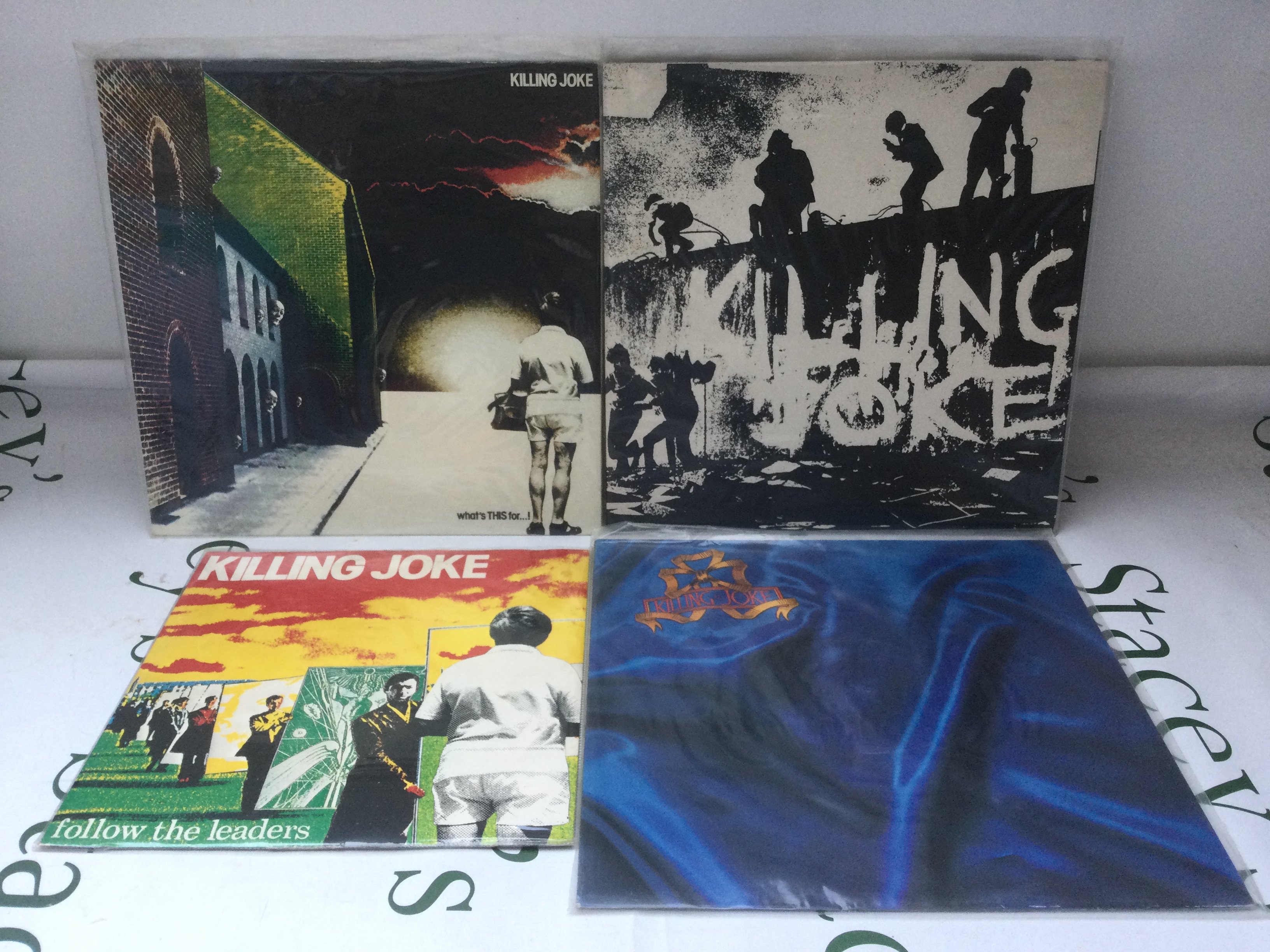 Three Killing Joke LPs and a 10" single.