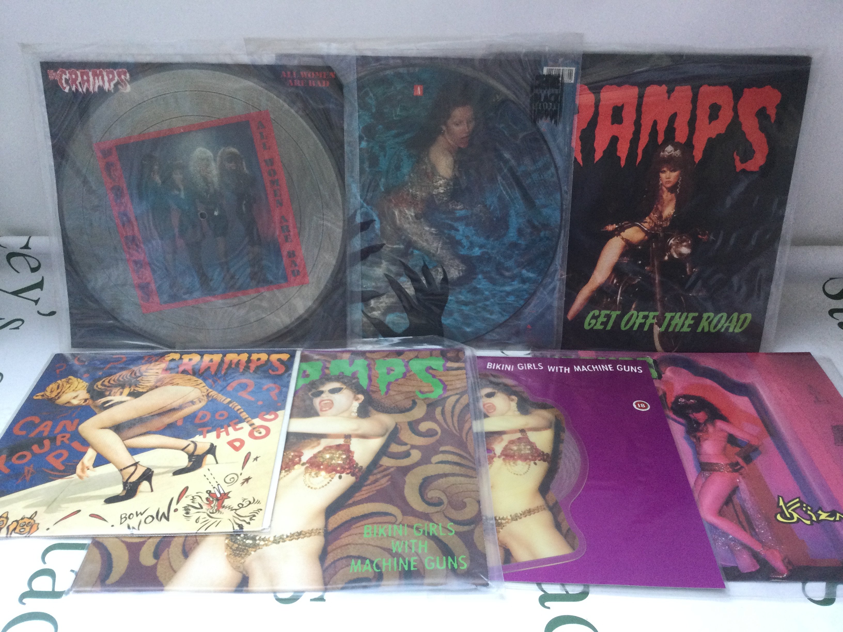 Seven 10" and 12" singles by The Cramps including picture discs.