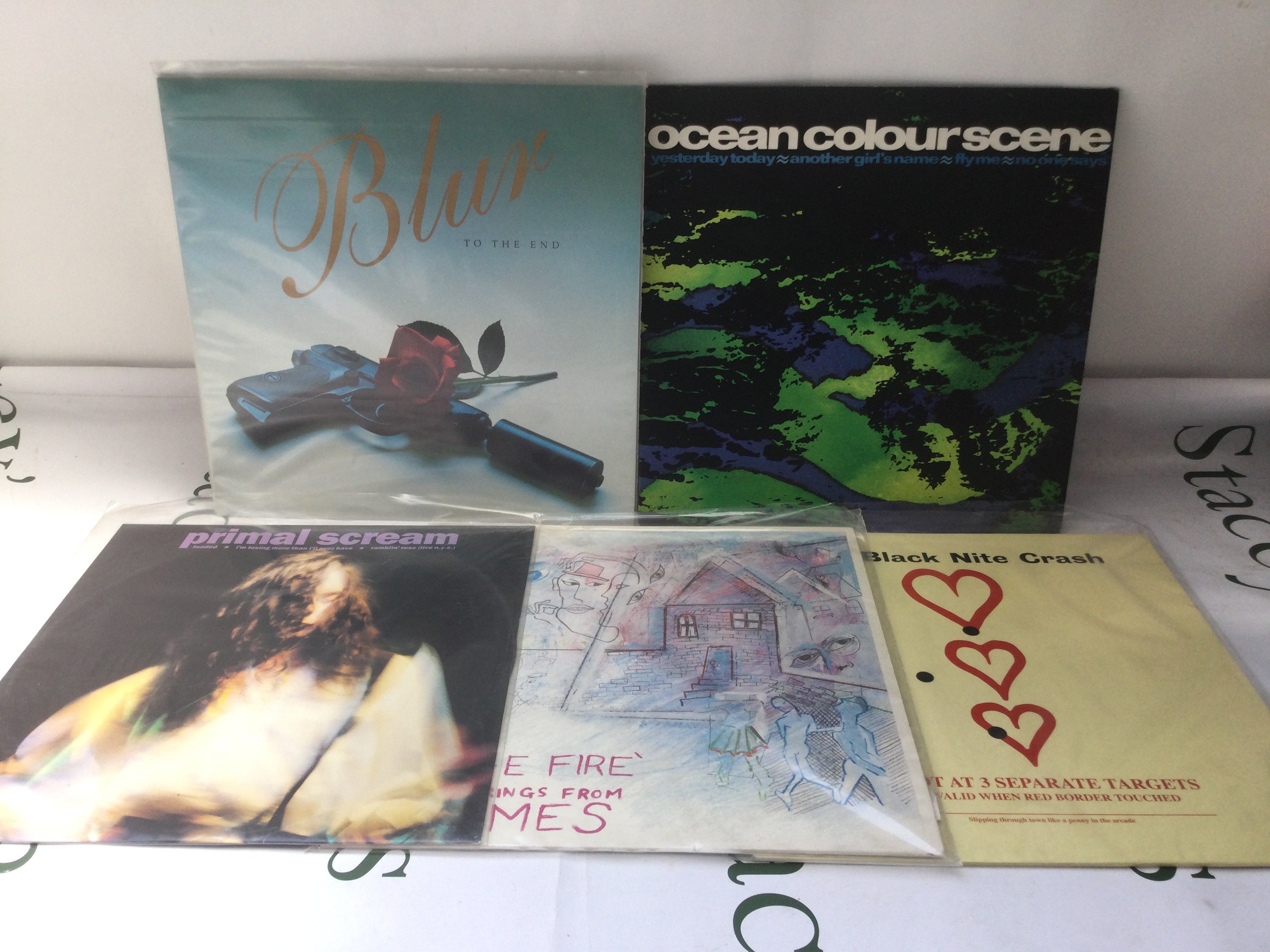 Five indie alternative 12" singles by various artists including Blur, Primal Scream and others.