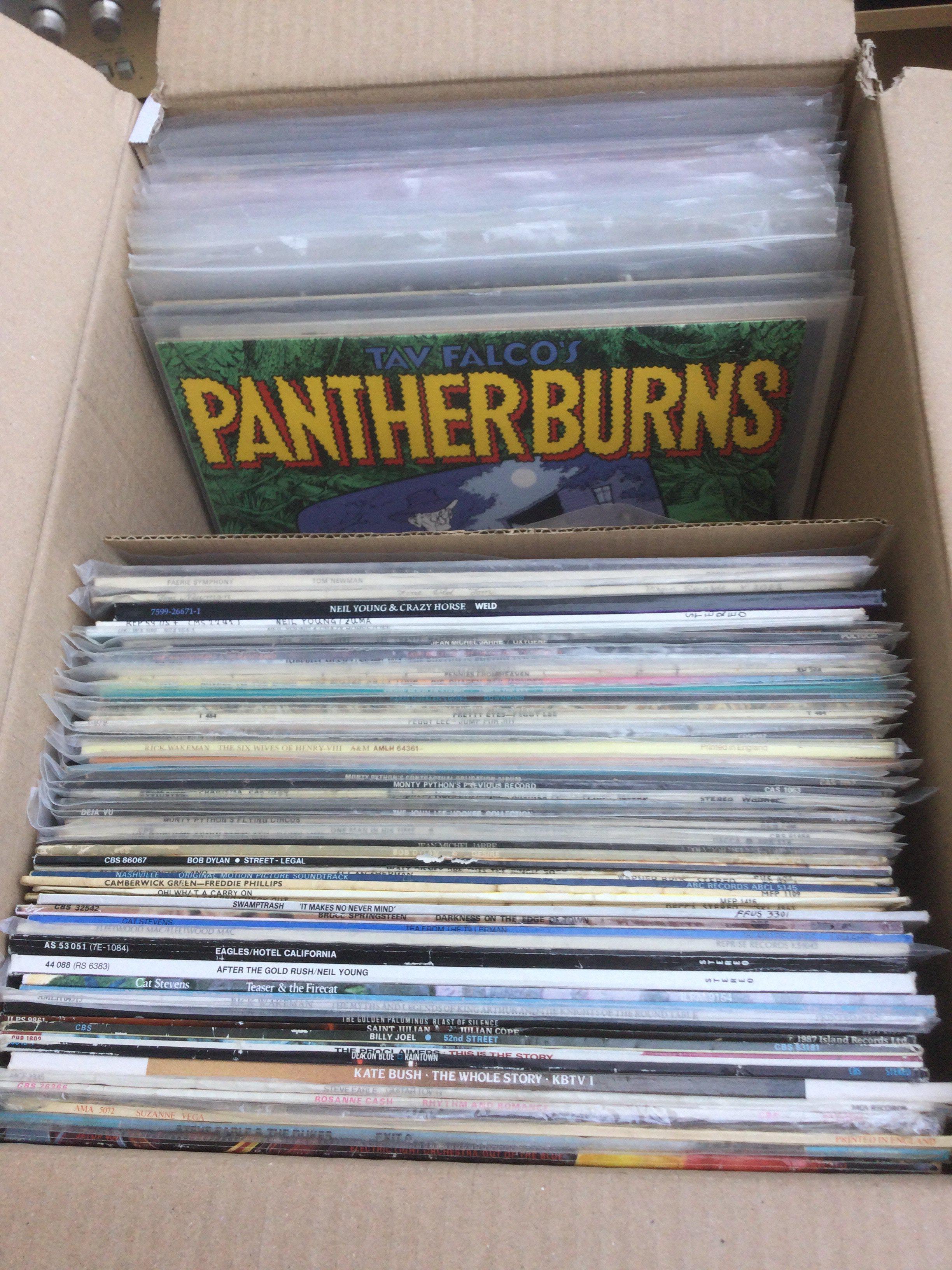 A box of LPs and 12" singles by various artists including Kate Bush, Sugarcubes, Neil Young and many more.