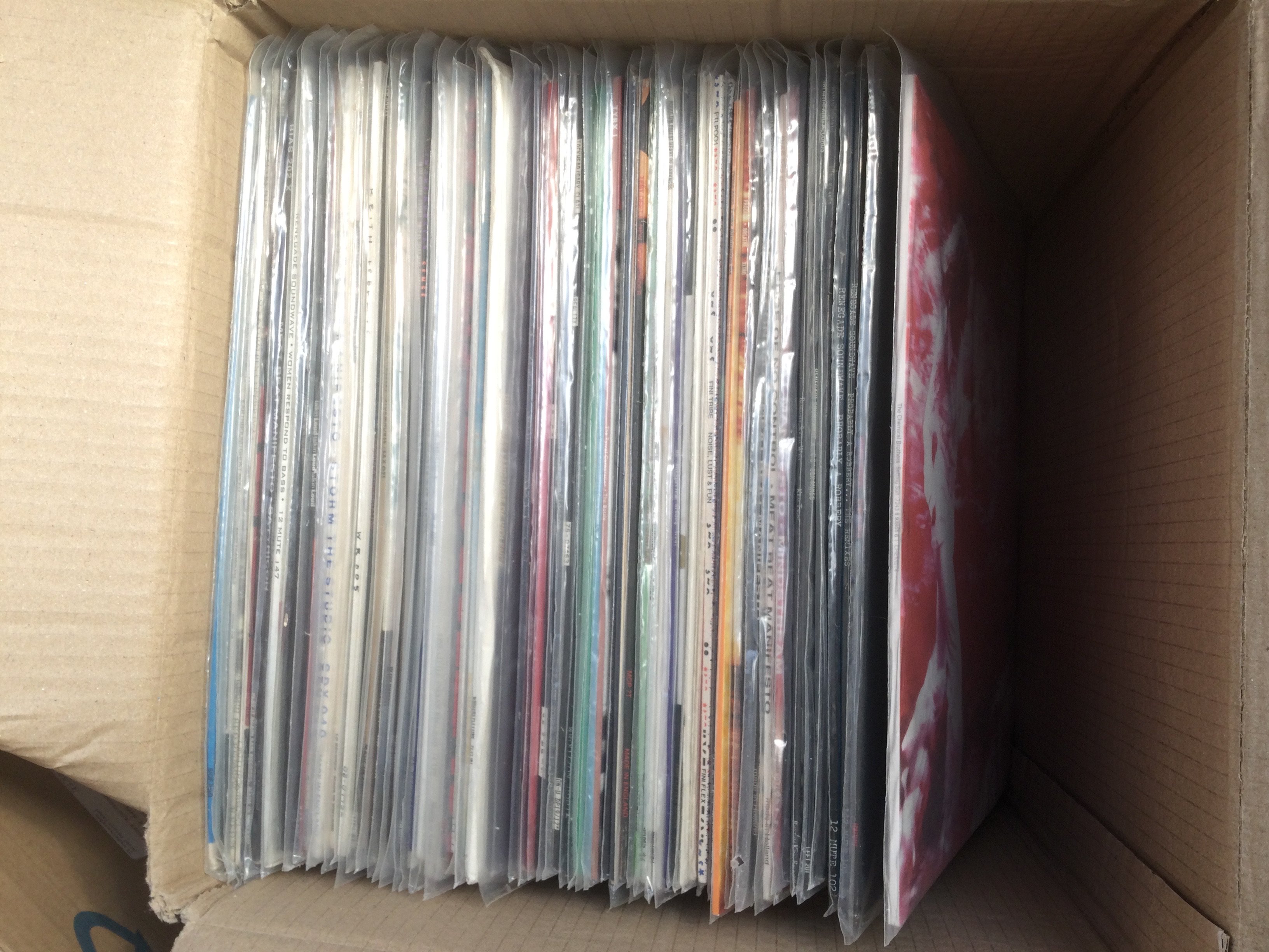 A box of dance, electro and hip hop LPs and 12" singles by various artists including Prodigy, Chemical Brothers, Renegade Soundwave and others.