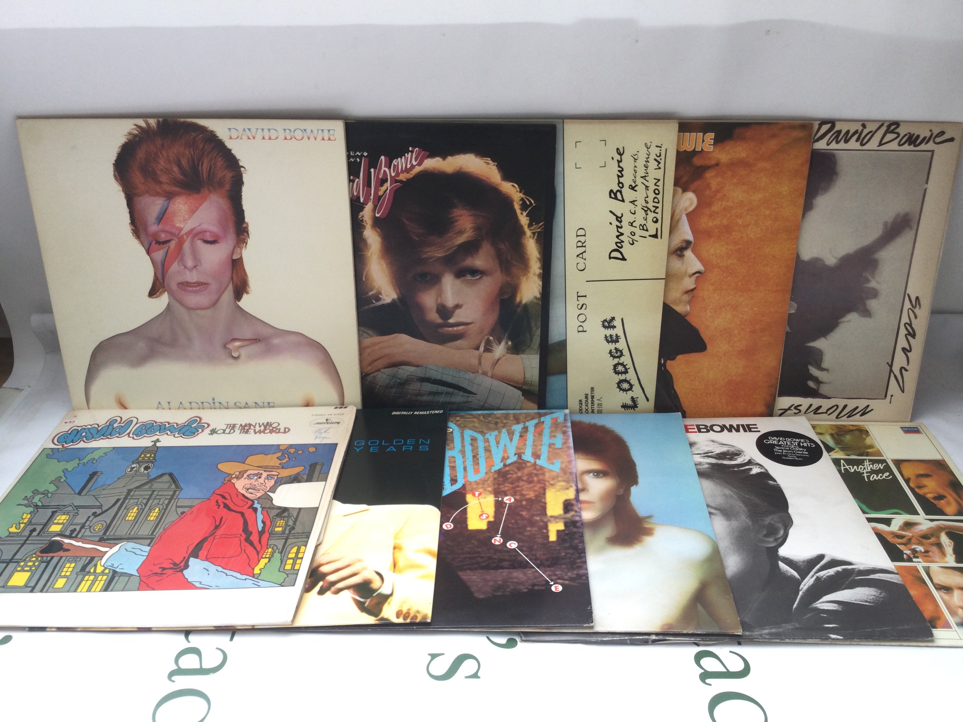 Eleven David Bowie LPs including Aladdin Sane, Lodger, Low and others.
