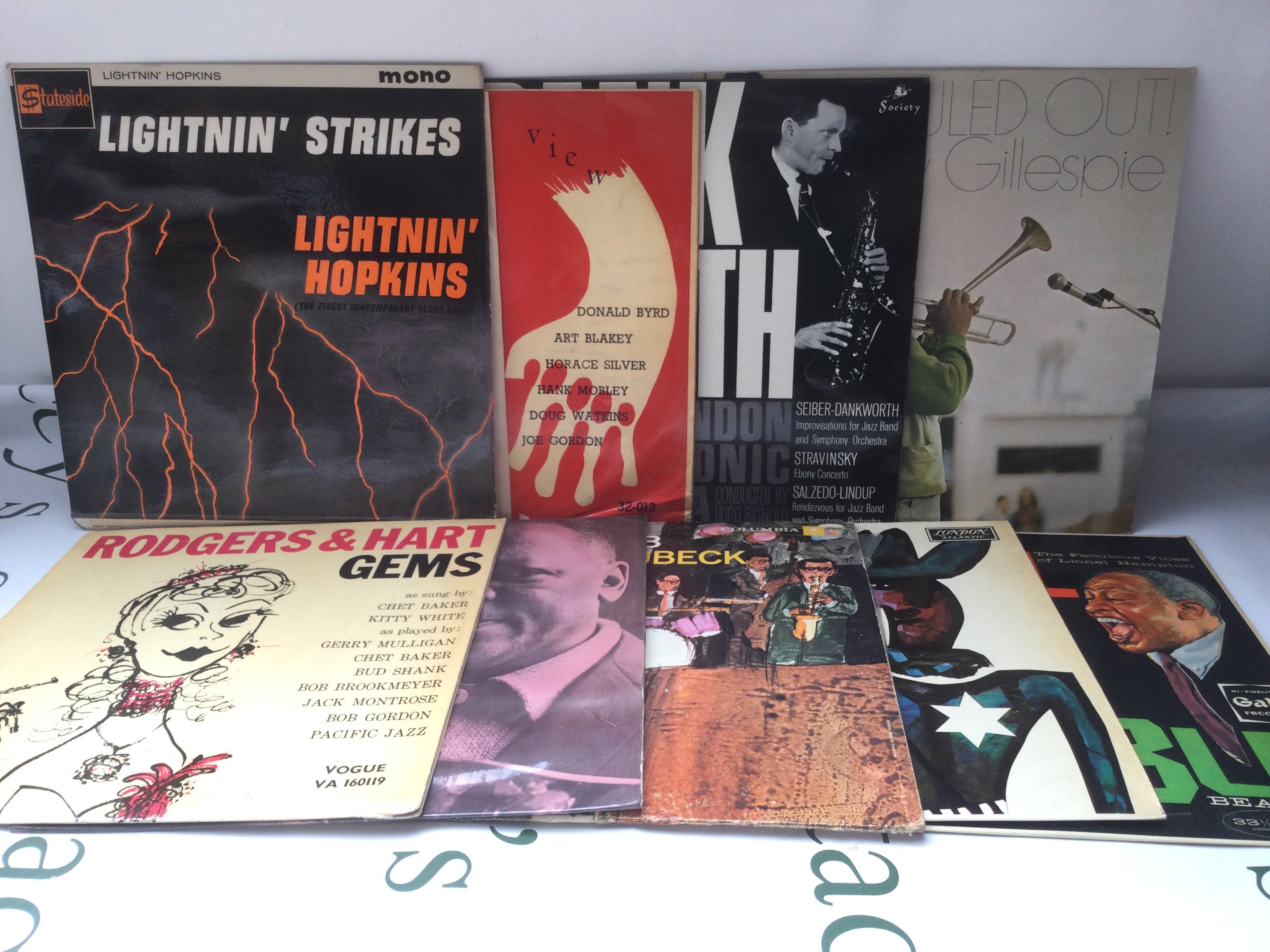 Eighteen jazz and blues LPs by various artists including Lightnin Hopkins, Dizzy Gillespie, Ramsey Lewis and others.