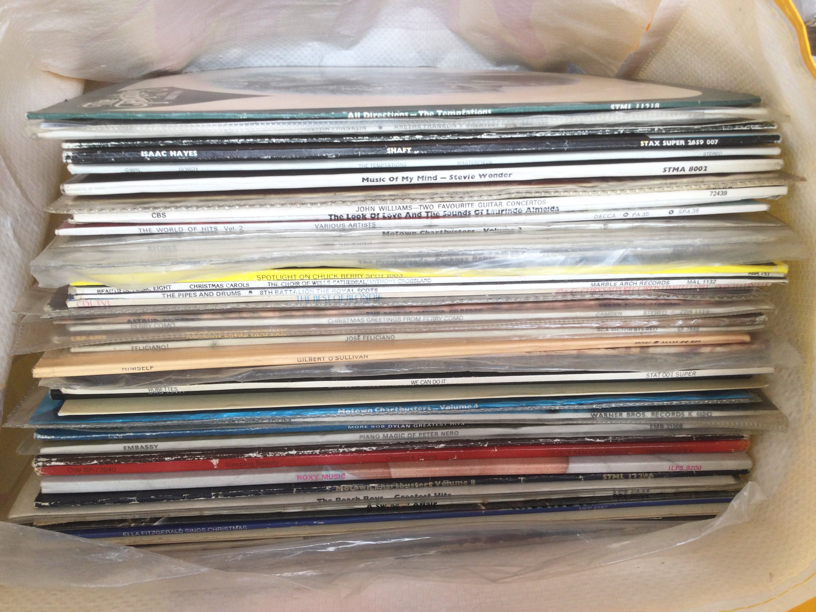 A collection of LPs by various artists including Isaac Hayes, Bob Dylan, Roxy Music and others.