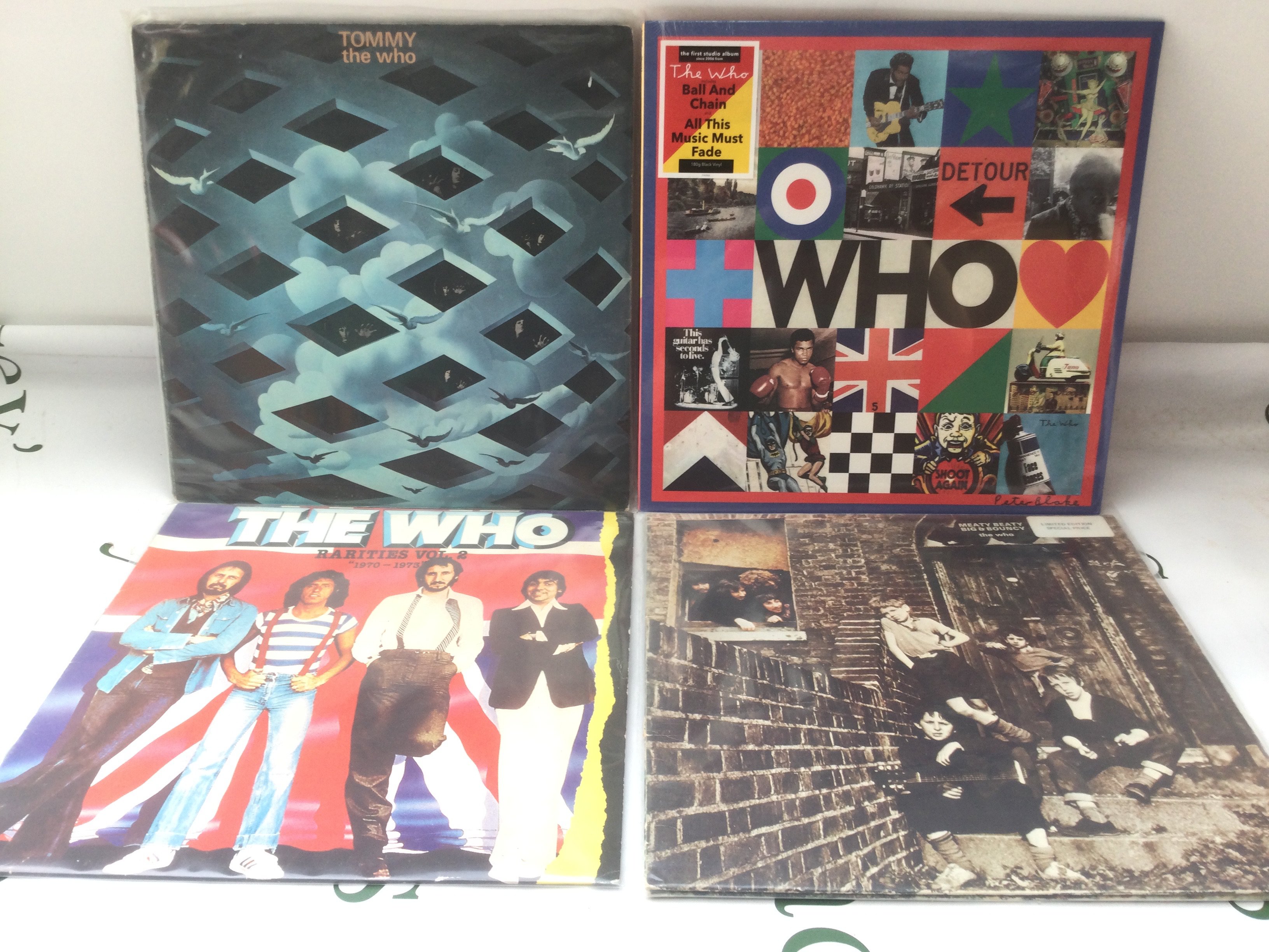 Four LPs by The Who including a sealed 2019 self titled album, Tommy and two compilations.