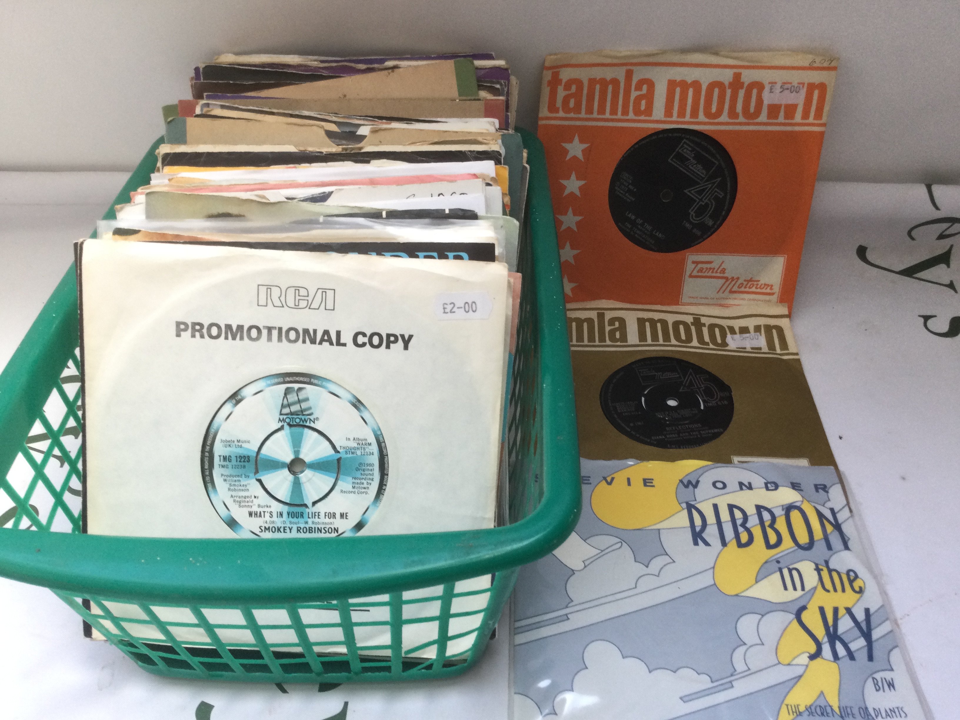 A collection of Tamla Motown 7" singles by various artists including Smokey Robinson, Stevie Wonder and others.