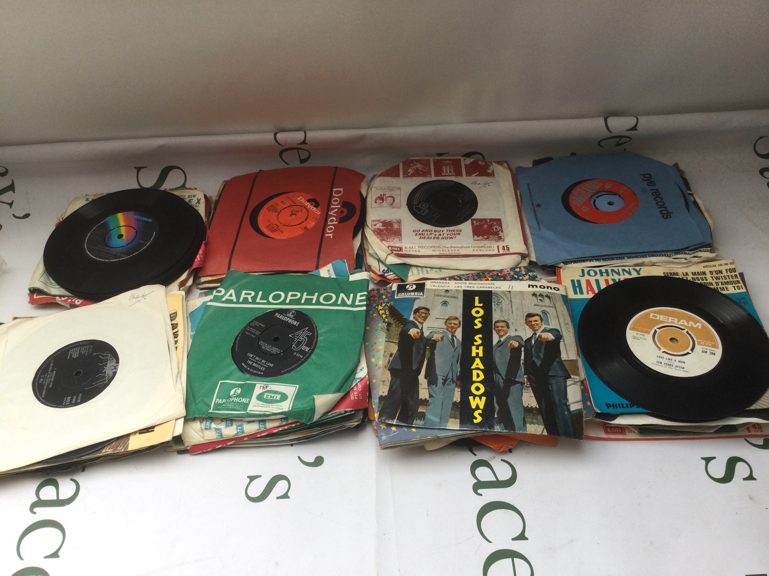 A small collection of 7" singles and EPs including The Beatles, T Rex, Ten Years After and others.